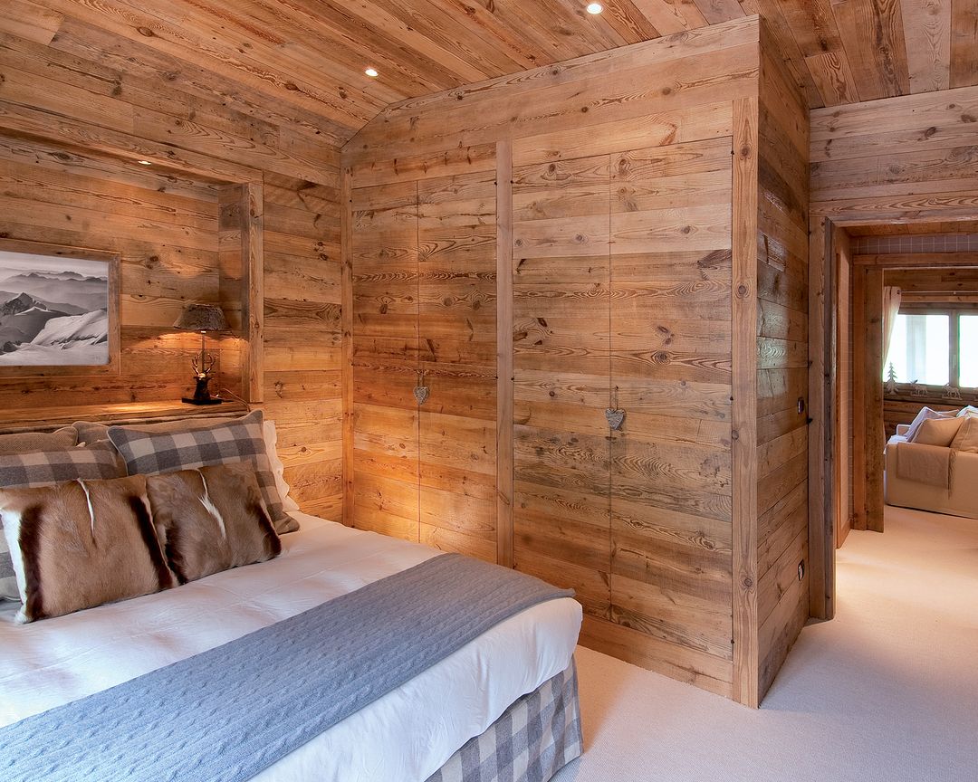 A cozy cabin-style bedroom