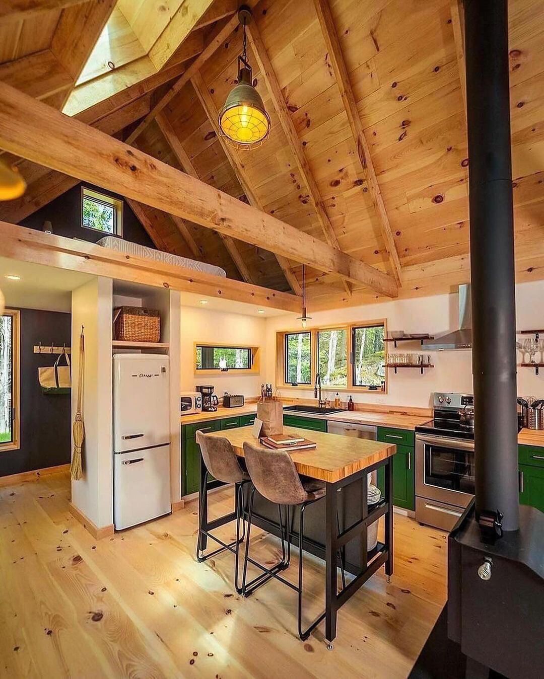 Cozy cabin-style kitchen with vaulted ceiling