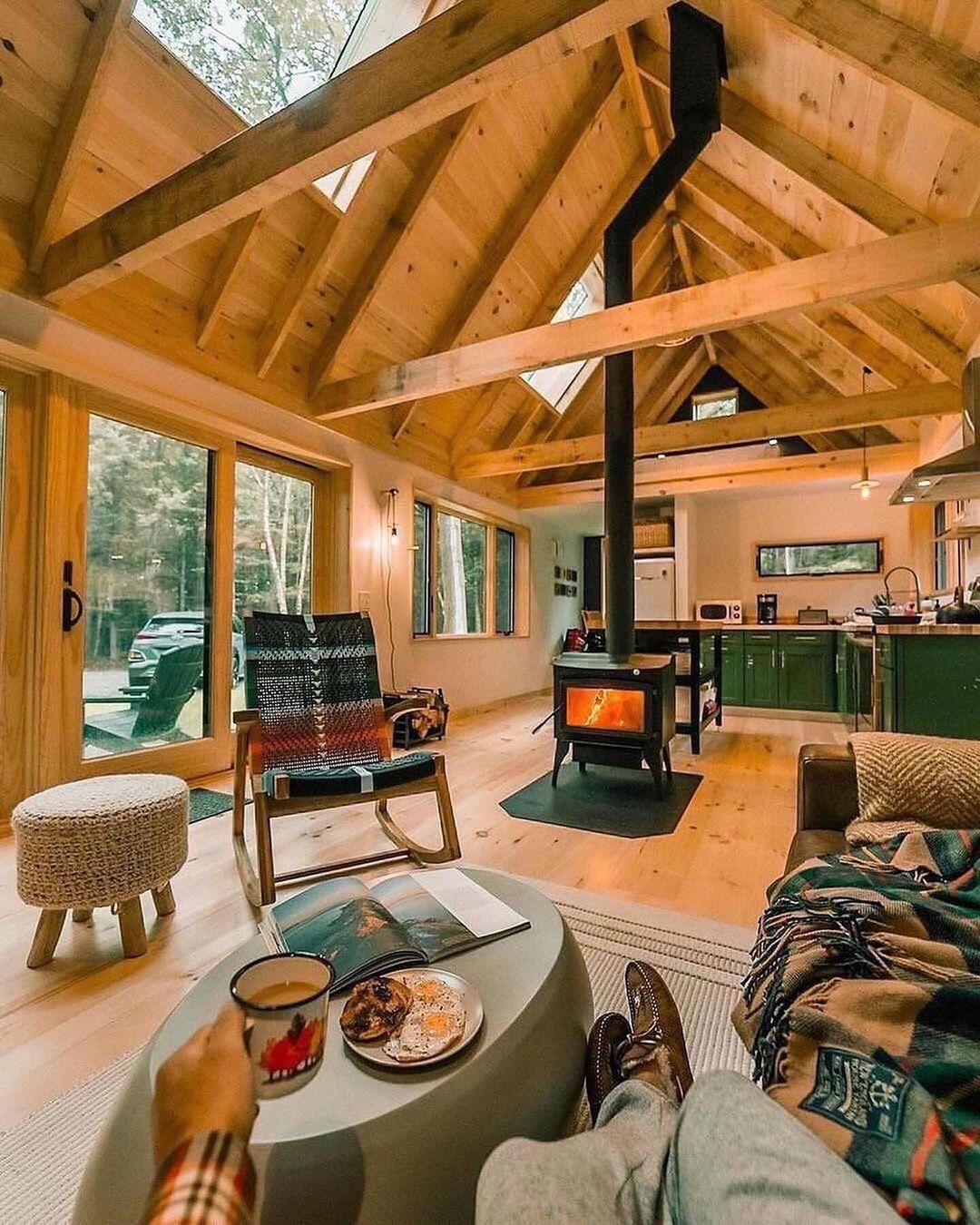 Cozy cabin interior with modern amenities and wood finishes