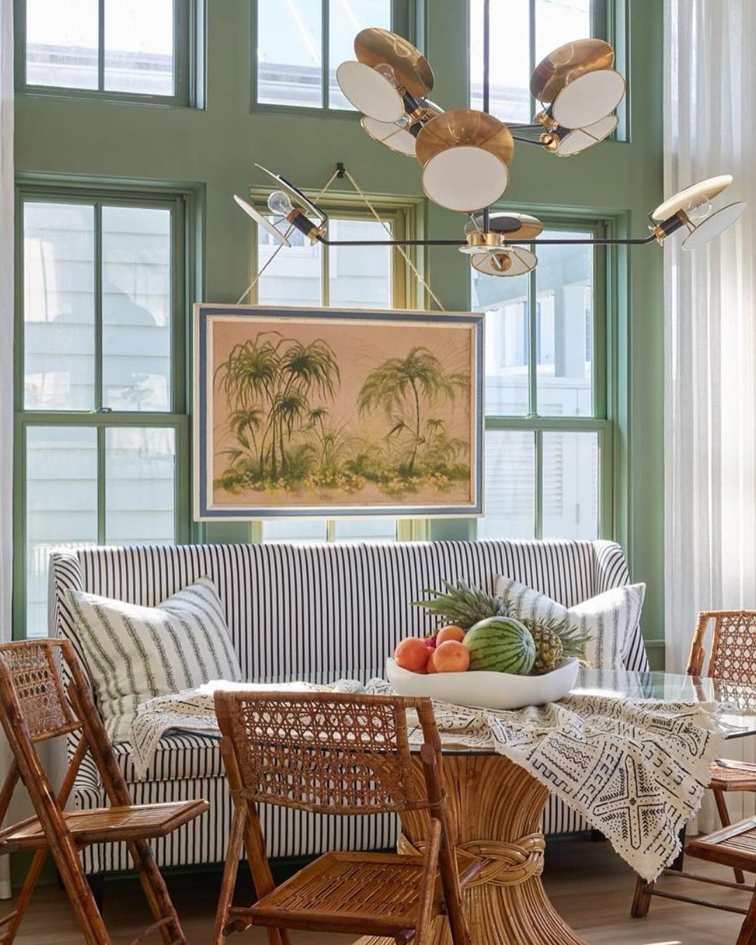 Cozy dining area with tropical artwork