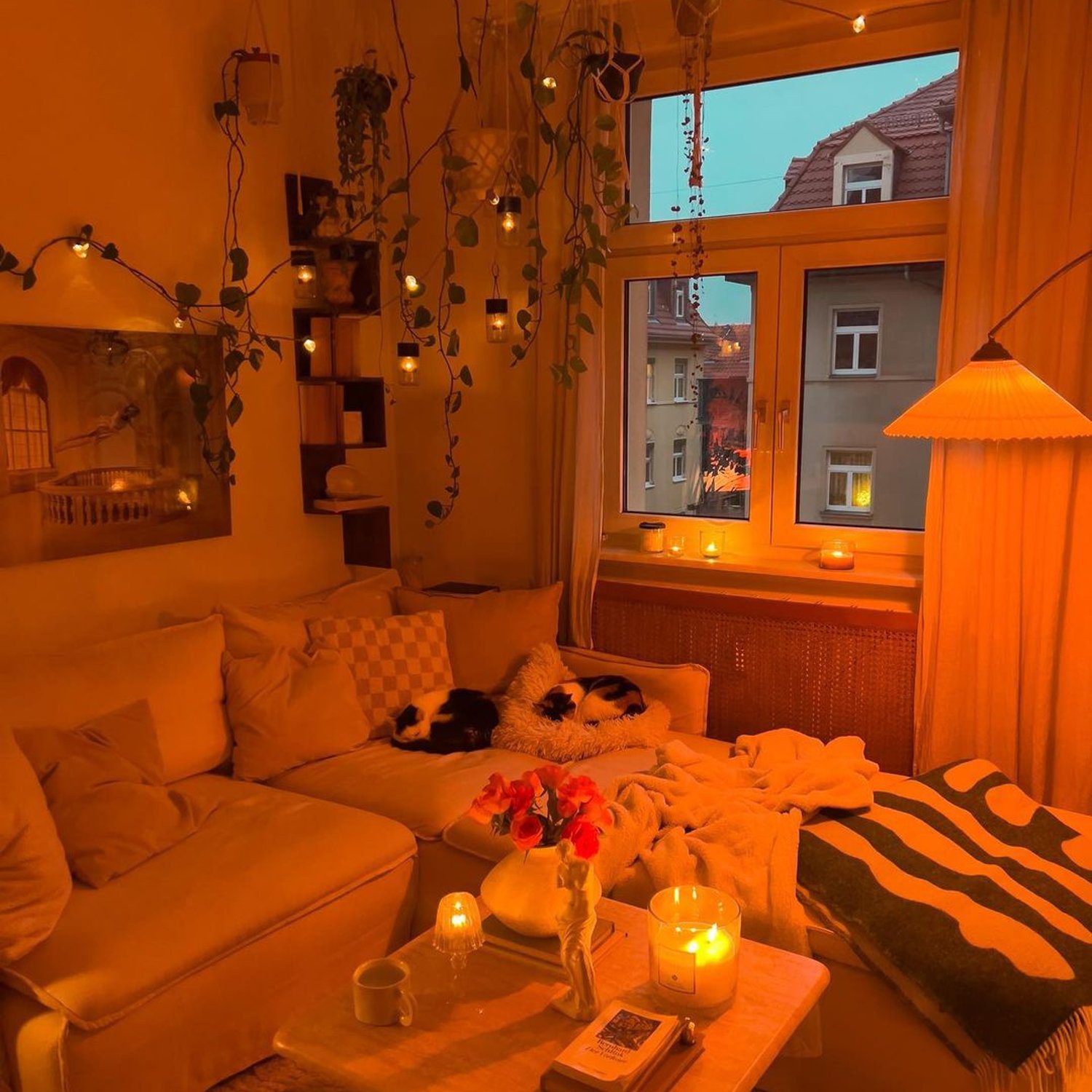 Cozy urban living room with warm lighting and plants