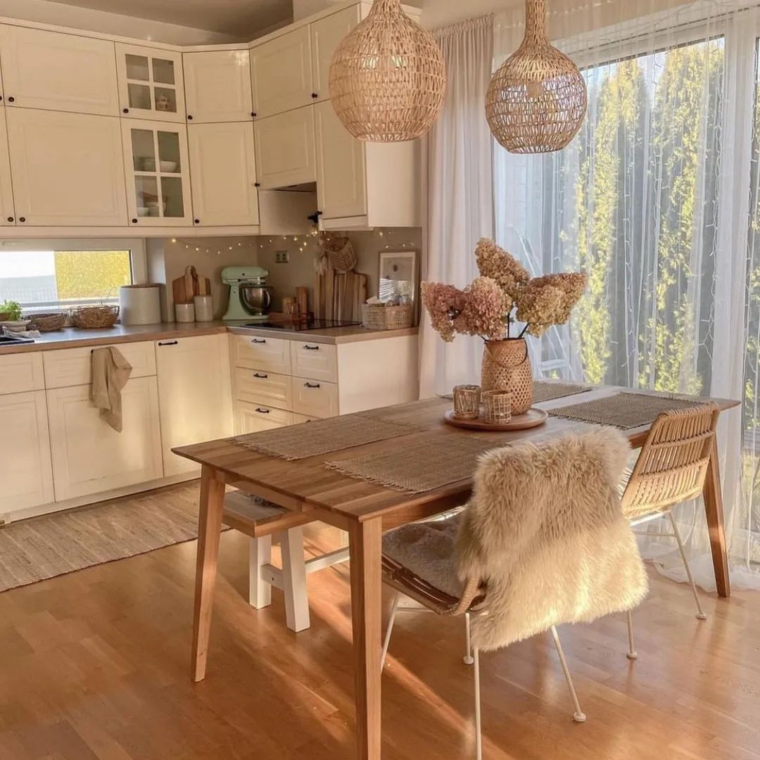 A cozy and well-lit kitchen with warm wood tones and rattan accents