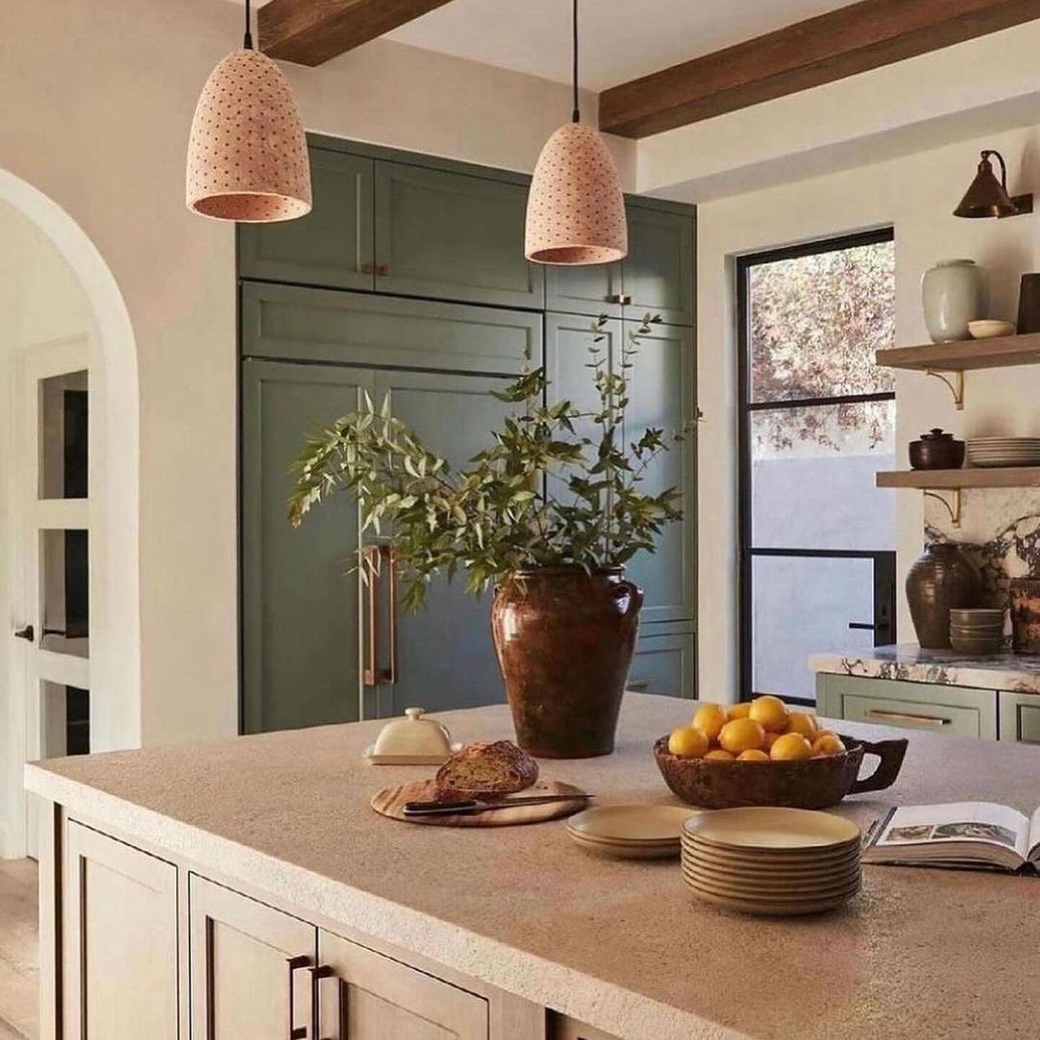 Warm and inviting kitchen space featuring terracotta accents