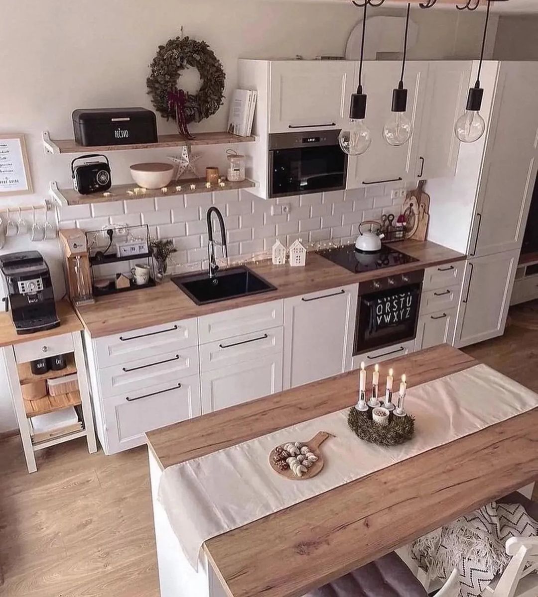 A cozy, well-lit kitchen with modern amenities and wooden accents