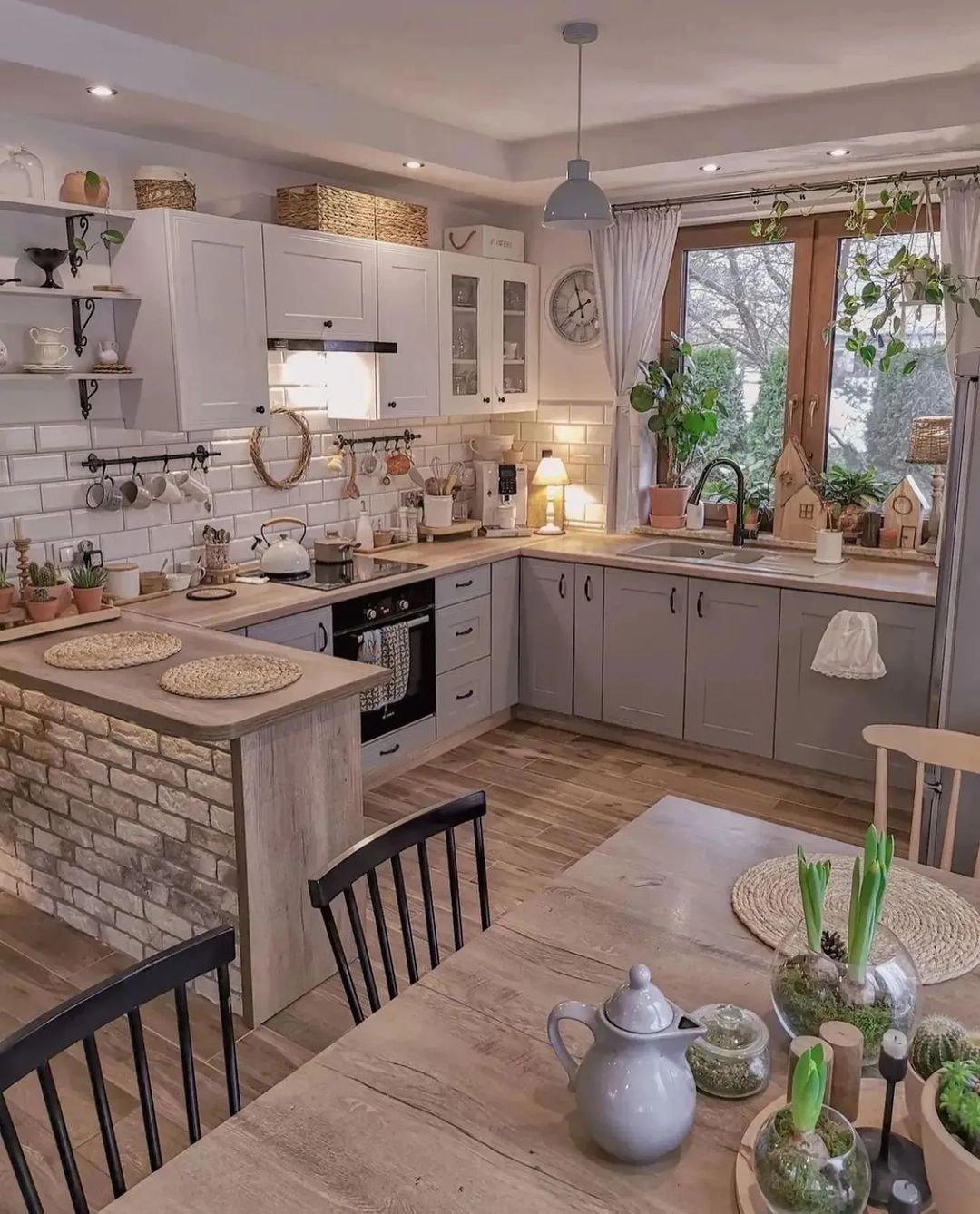 A cozy and inviting kitchen with warm wooden accents and abundant natural light.