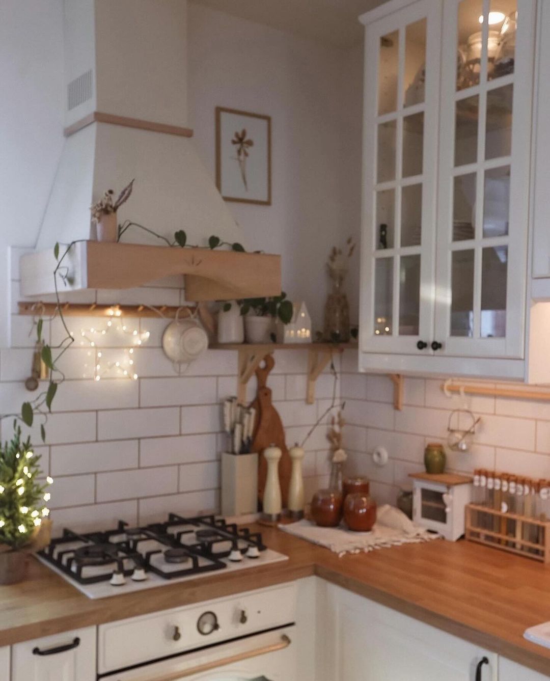 Cozy and well-lit kitchen area with warm wooden accents