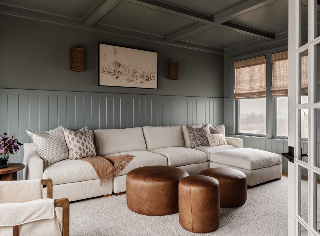 A cosy and welcoming living room featuring a beige sectional sofa