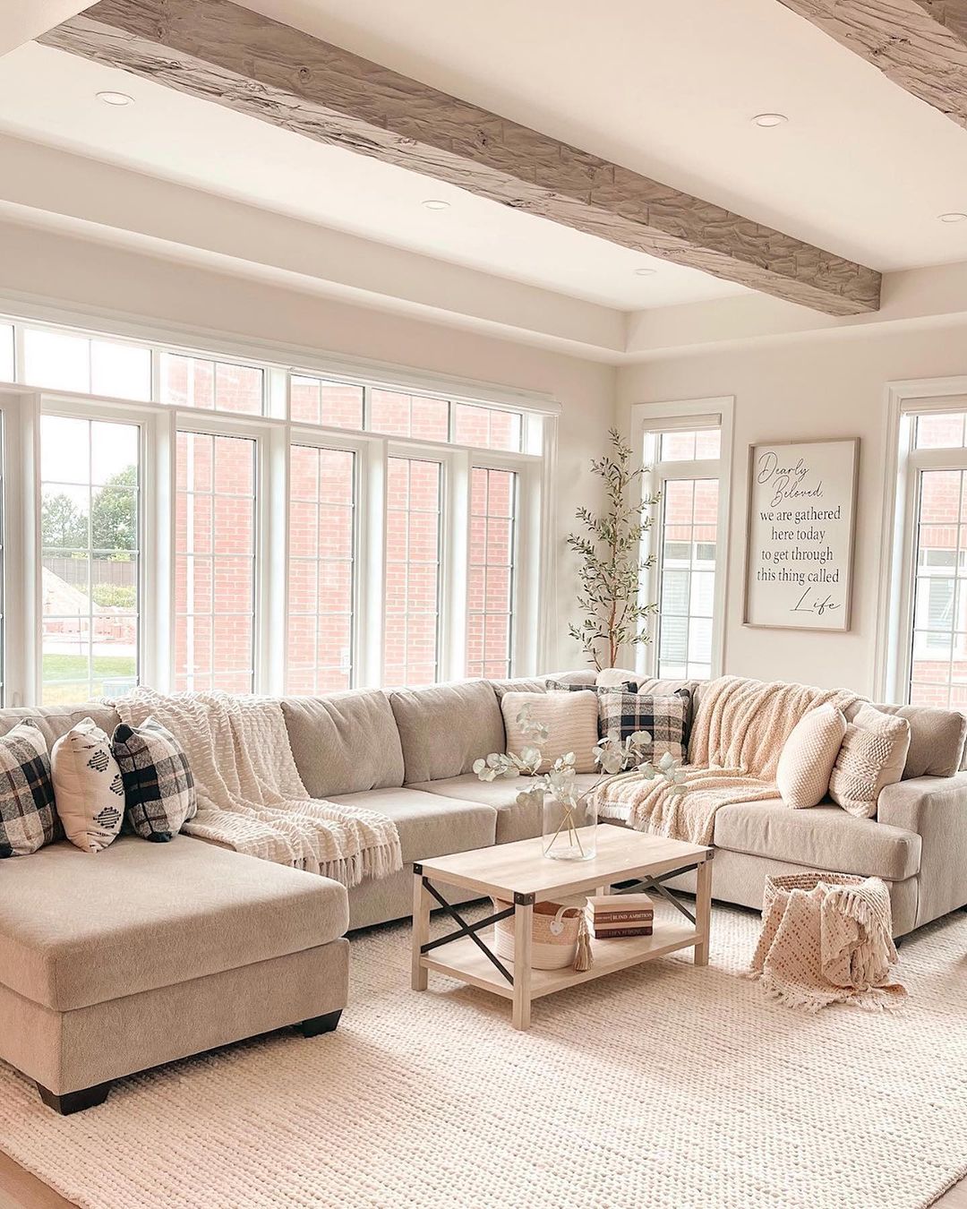 A cozy and welcoming living room with ample natural light