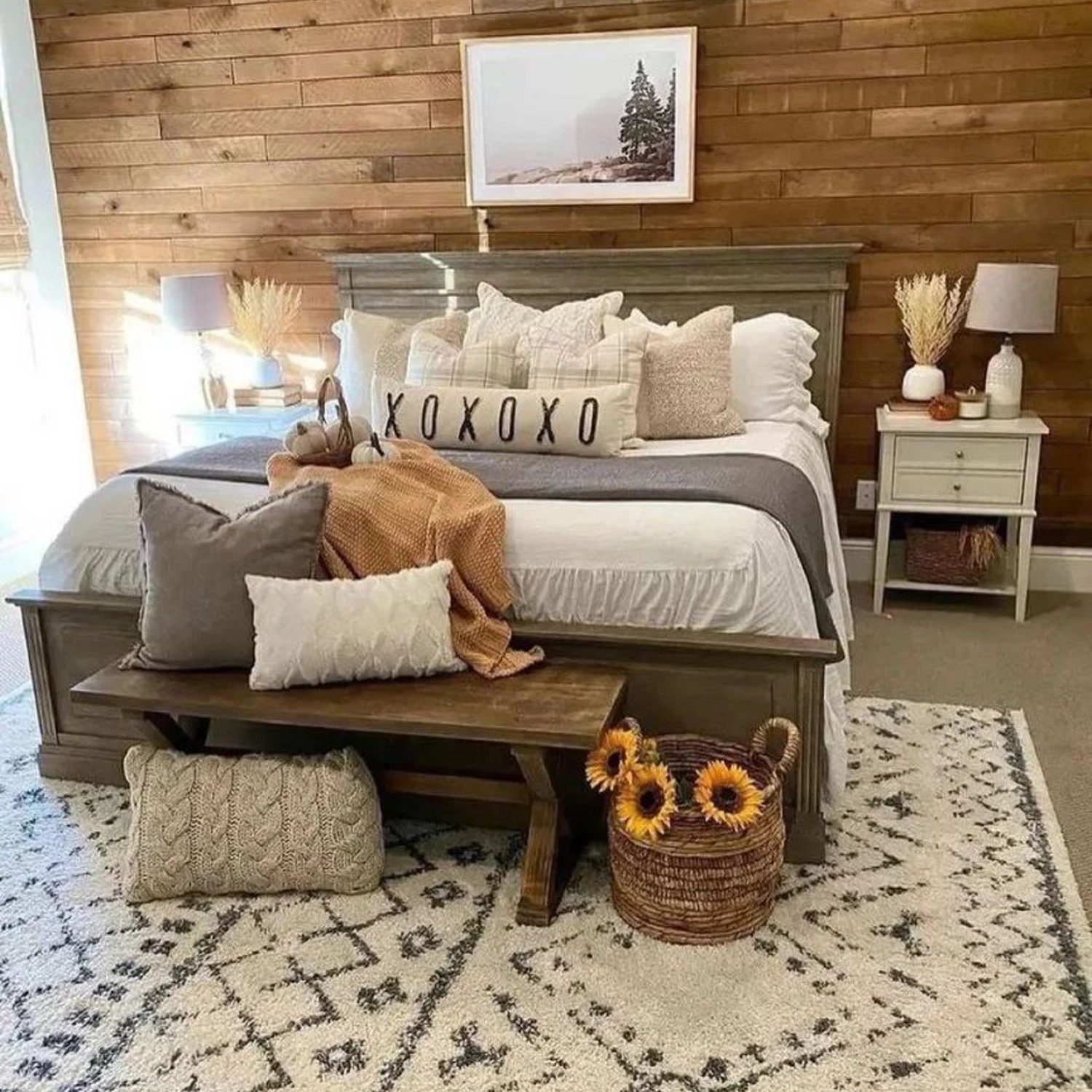 Cozy rustic bedroom with wooden accent wall