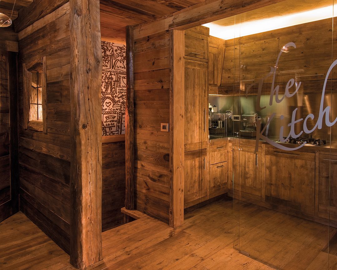 A cozy rustic kitchen with warm wood tones