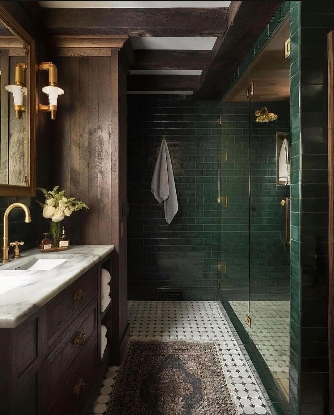 A dark-toned bathroom with rich texture contrasts.