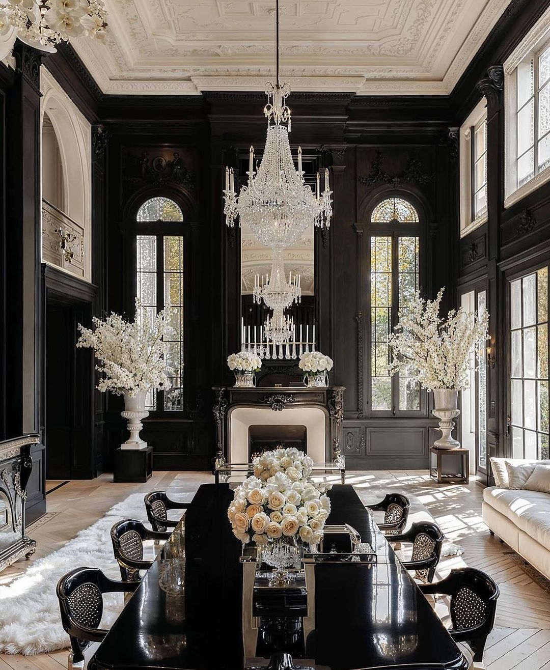 A grand dining room with contrasting colors and regal furnishings