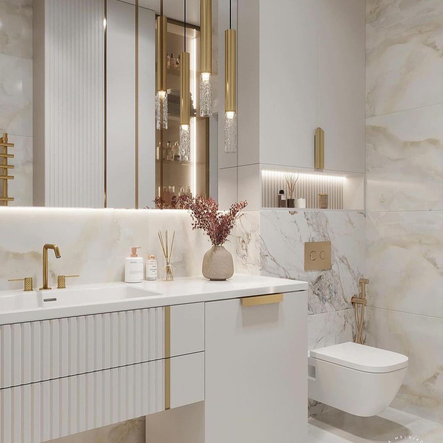 Luxurious modern bathroom with marble detailing and gold fixtures