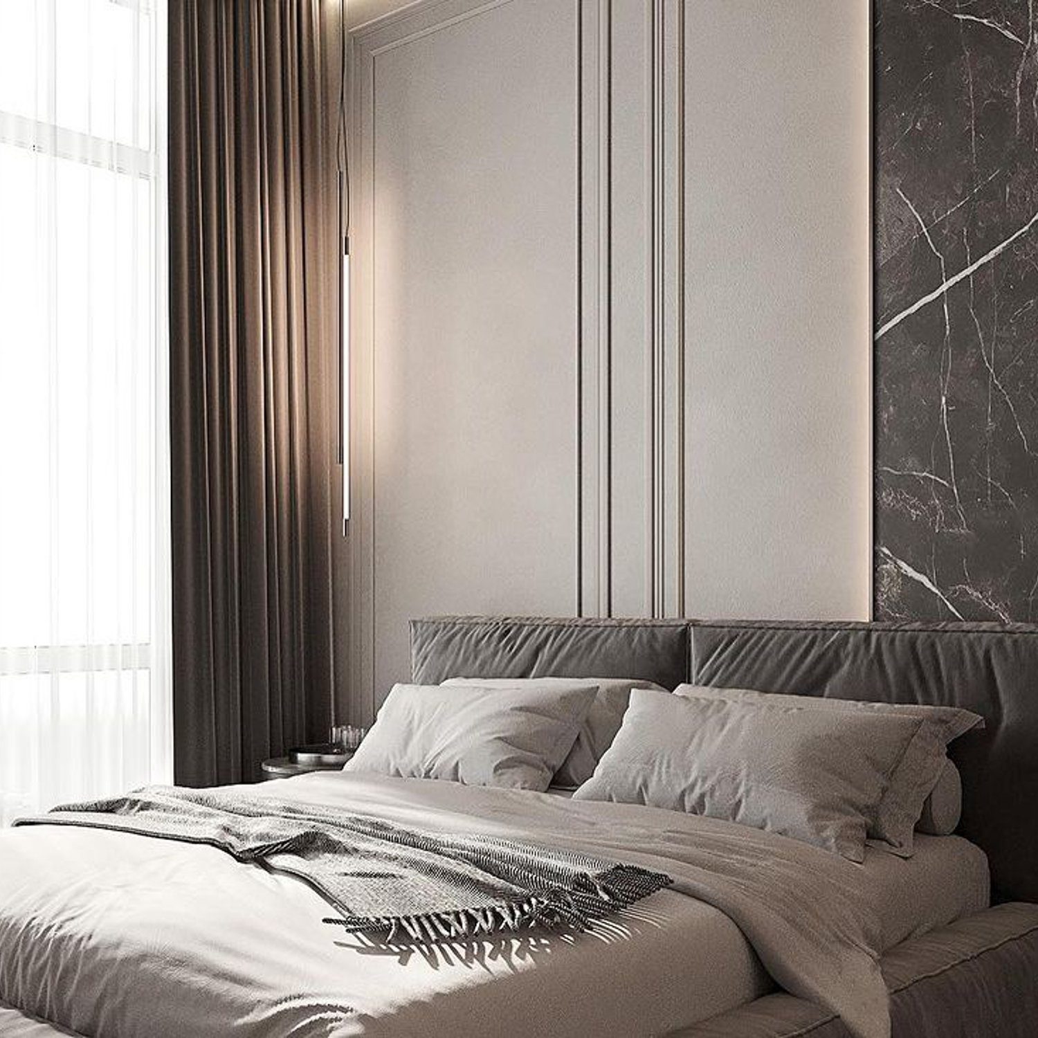 Elegant minimalist bedroom with a sophisticated marble accent