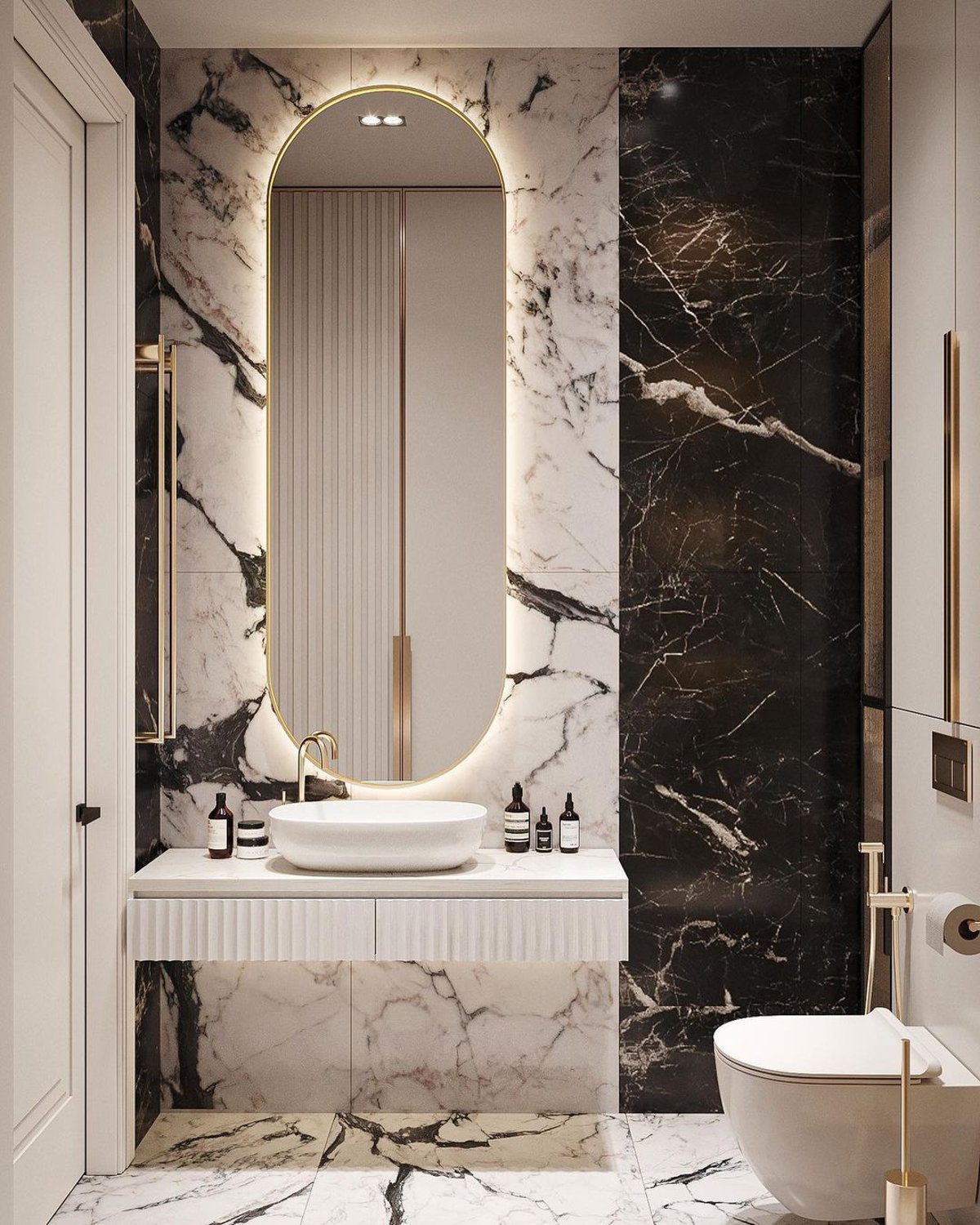 Luxurious bathroom with marble and gold accents