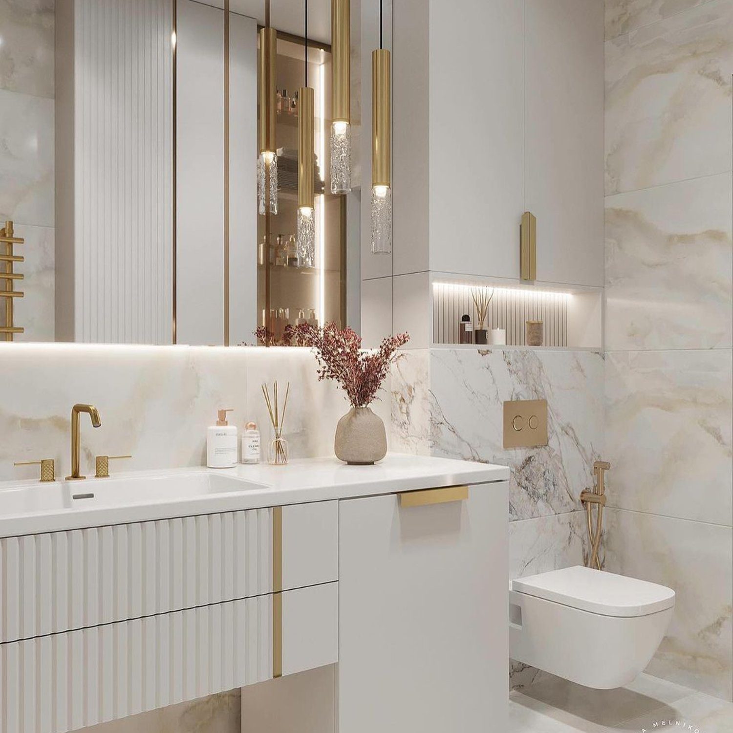 Elegant marble-themed bathroom featuring gold accents