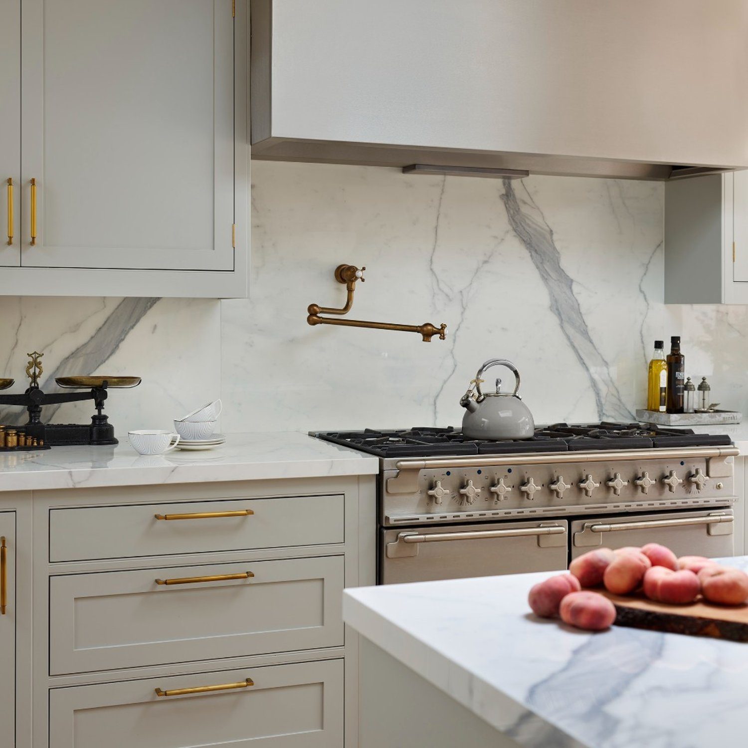 Elegant kitchen with marble backsplash