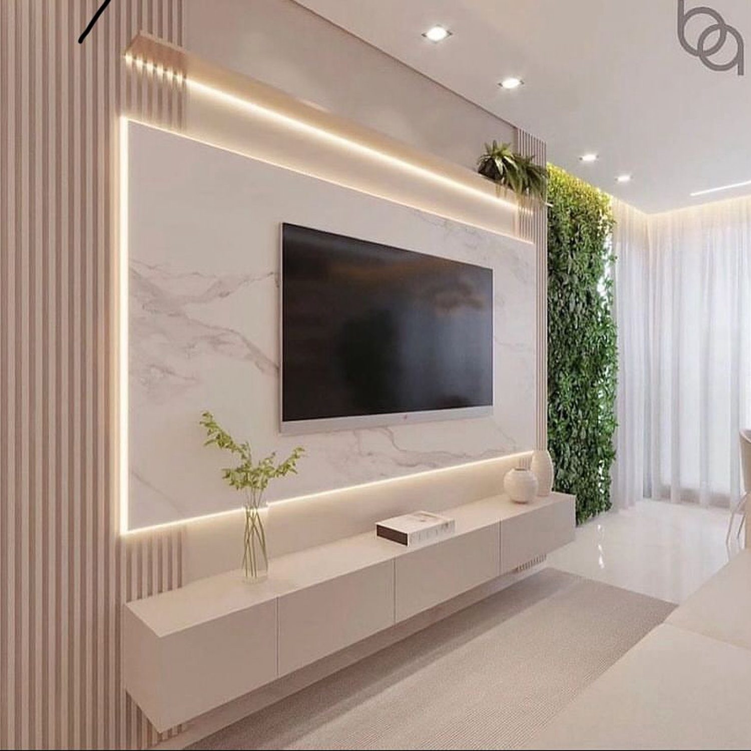 A modern living room featuring a wall-mounted TV surrounded by elegant marble paneling, with ambient lighting accents and a verdant vertical garden.