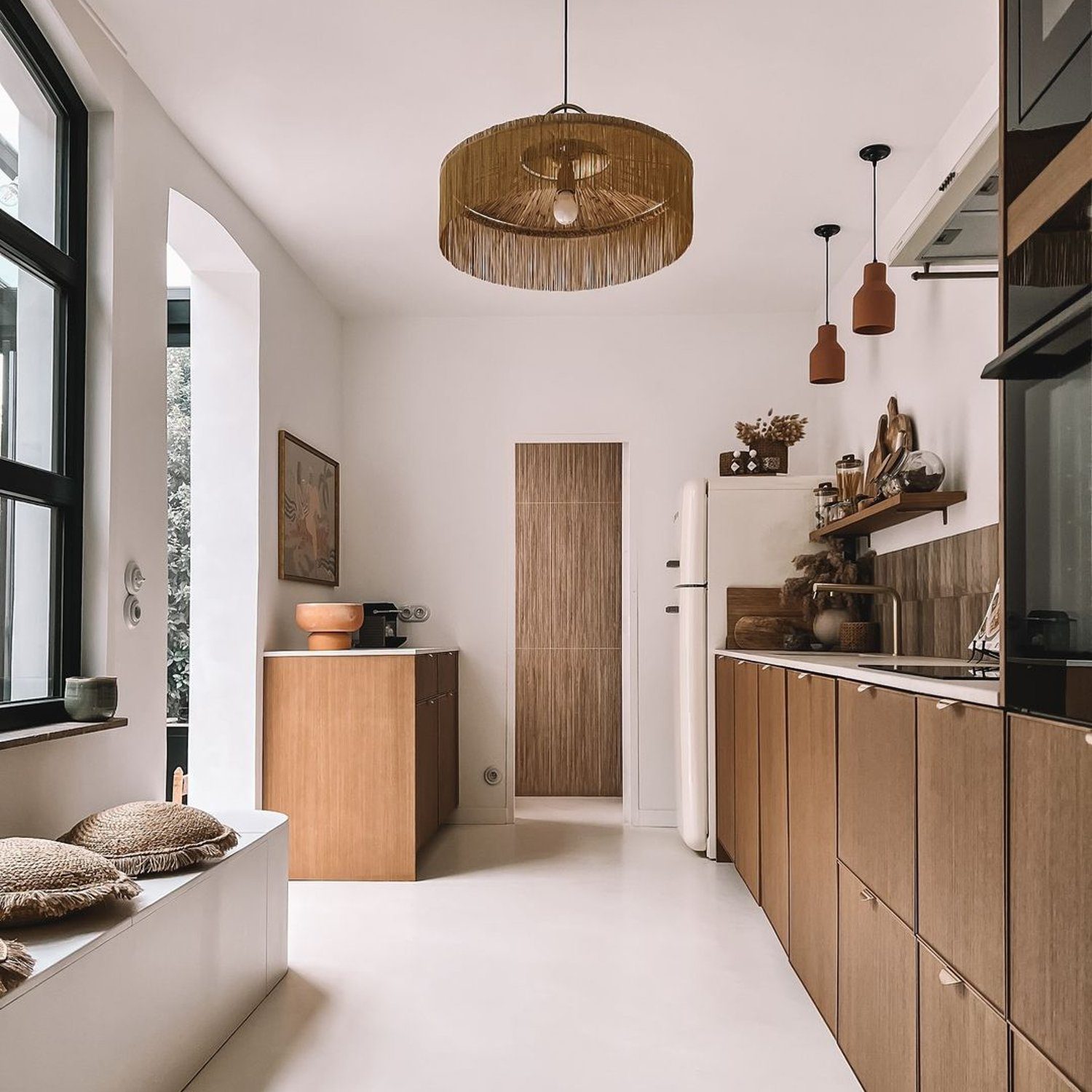 Minimalist kitchen with wooden accents and modern appliances