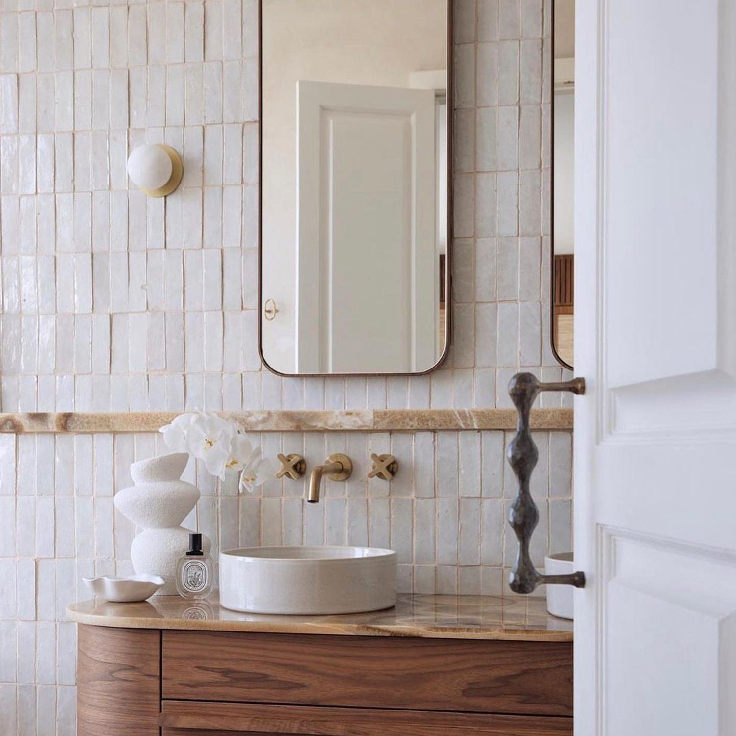 Elegant bathroom with textured tiles