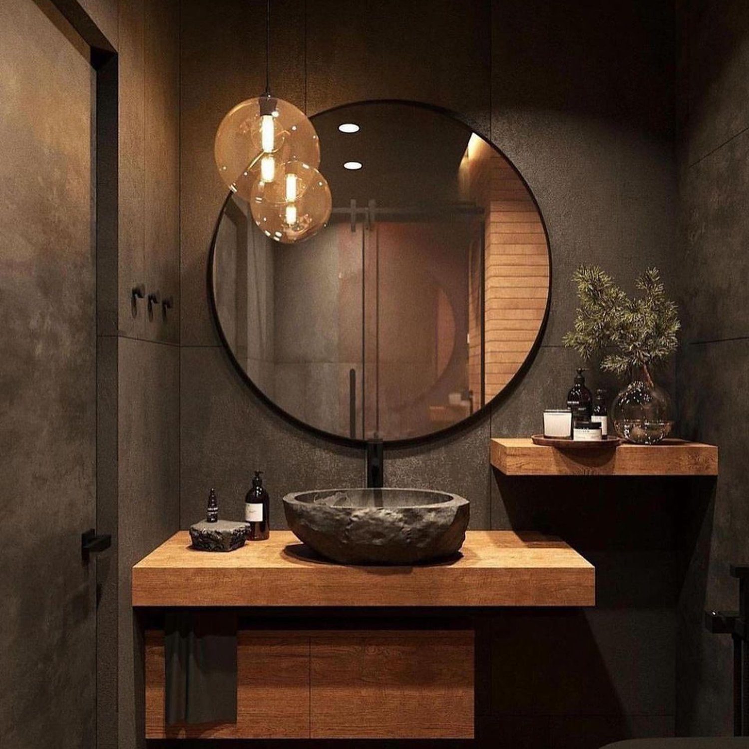 Modern and elegant bathroom with a large circular mirror