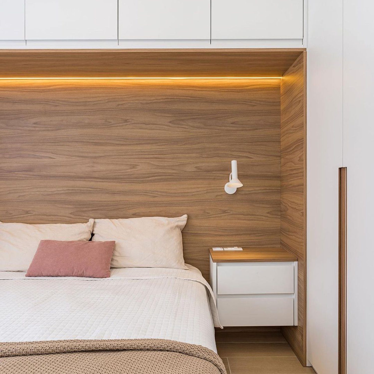 Modern and elegant bedroom with harmonious wood accents