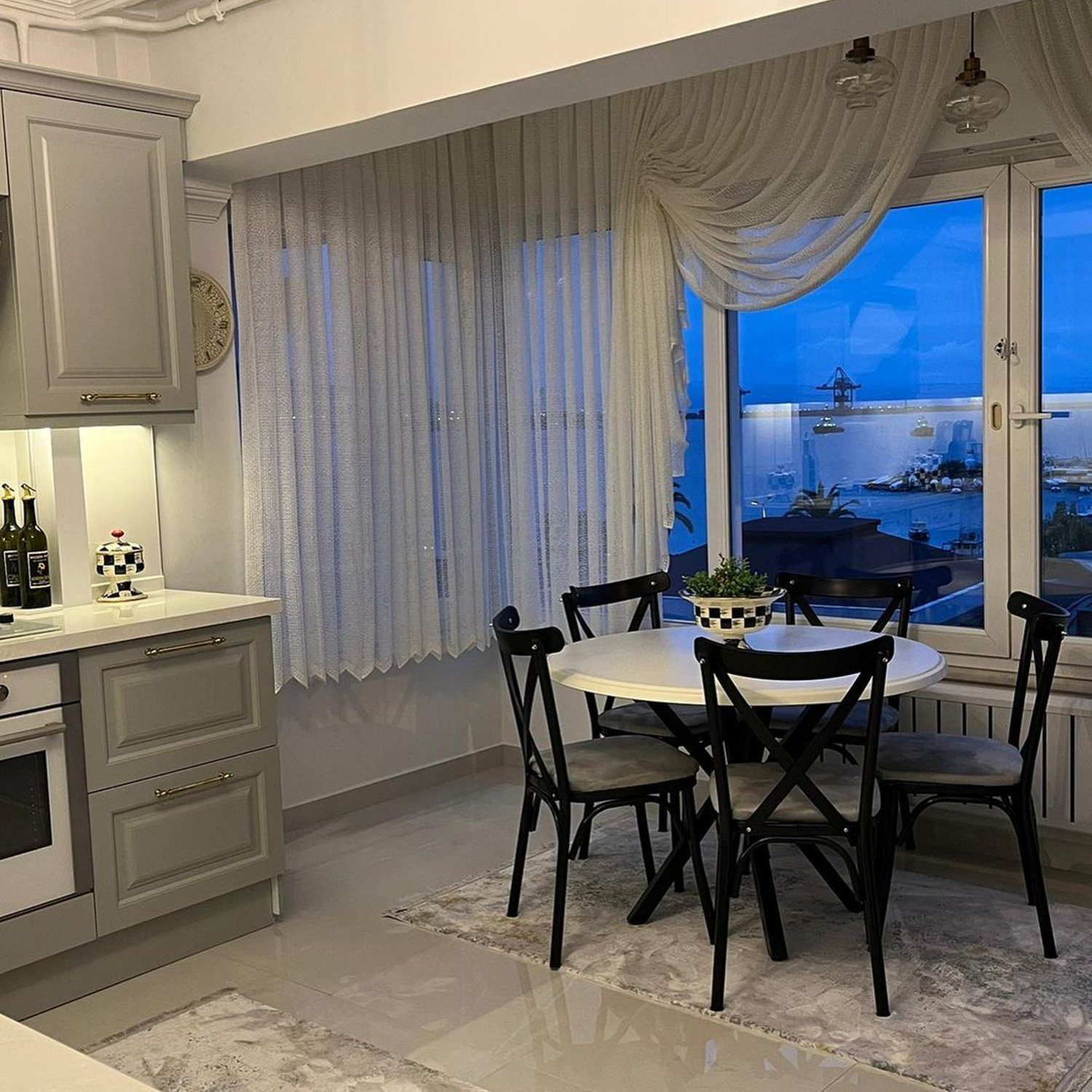 Elegant kitchen and dining area with a view