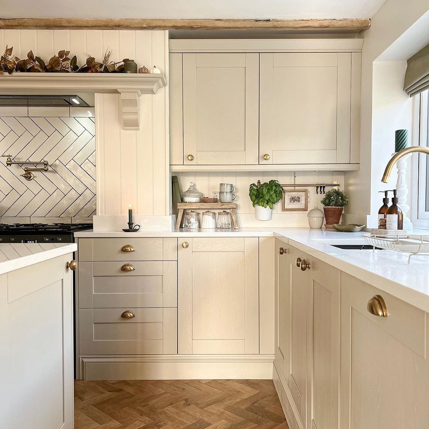 Elegant kitchen design with herringbone flooring