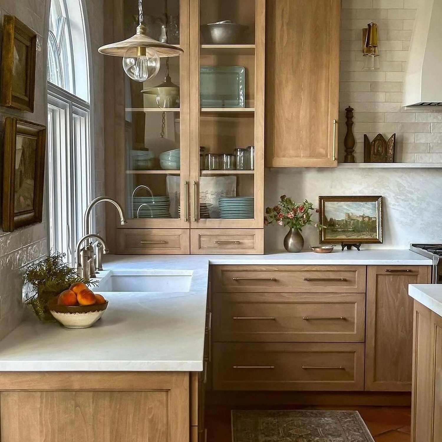 Elegant wooden kitchen design featuring ample natural light