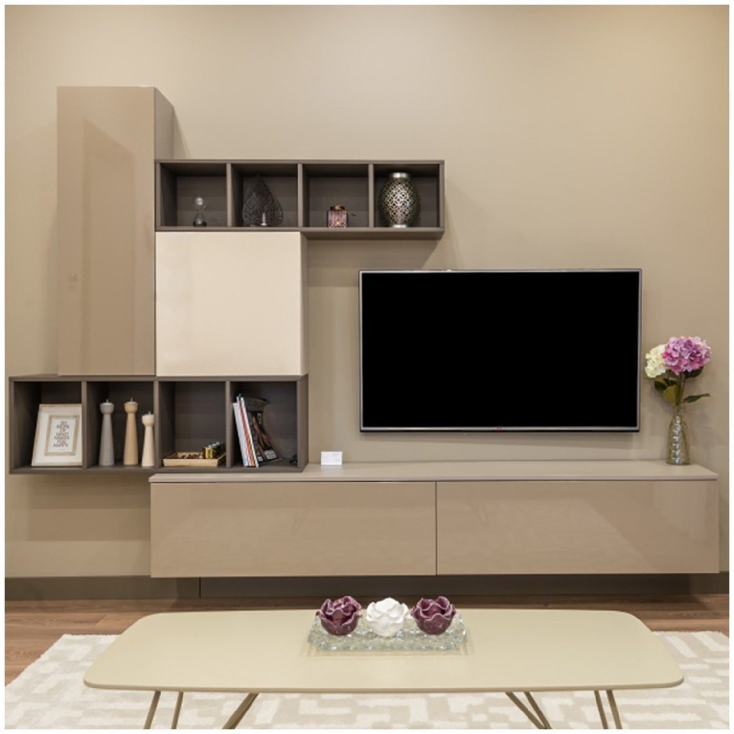 Elegant and minimalistic living room setup with a wall-mounted TV