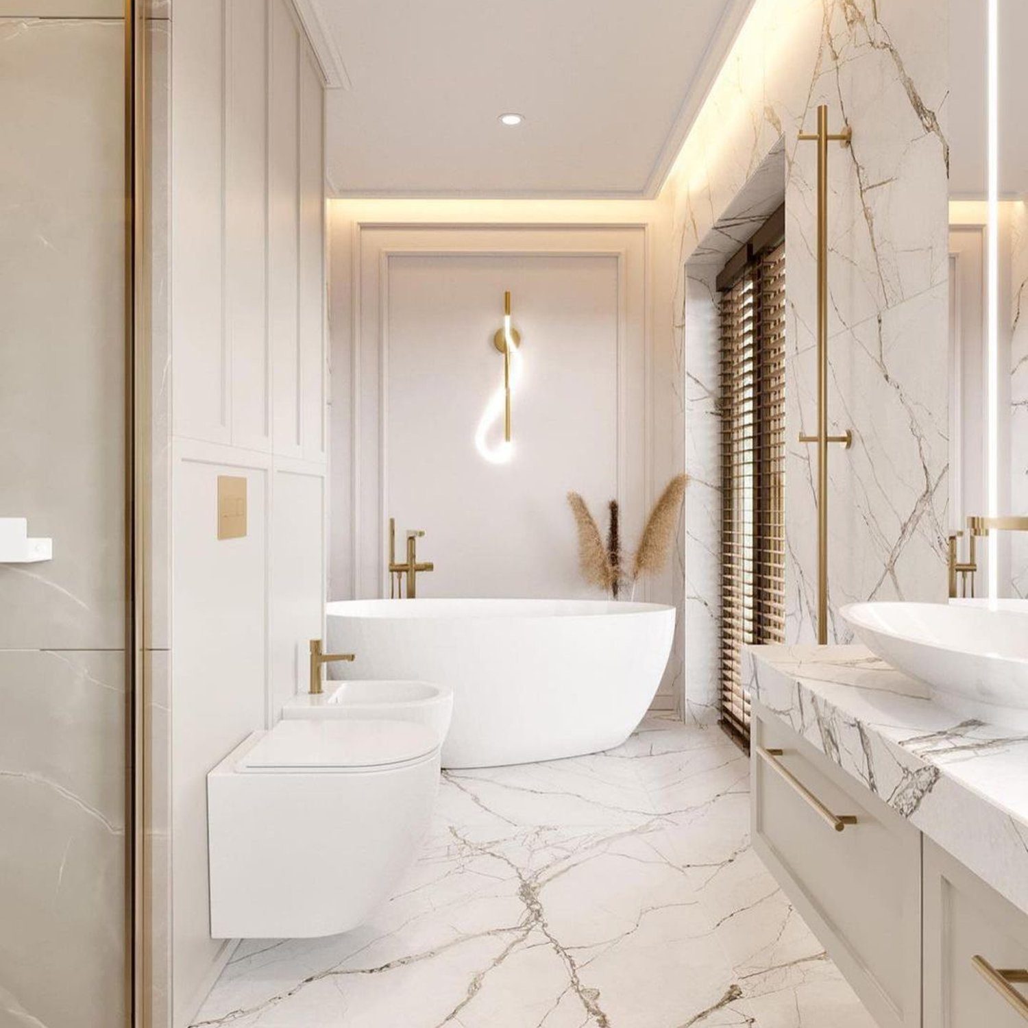 A luxurious bathroom featuring marble detailing and gold accents