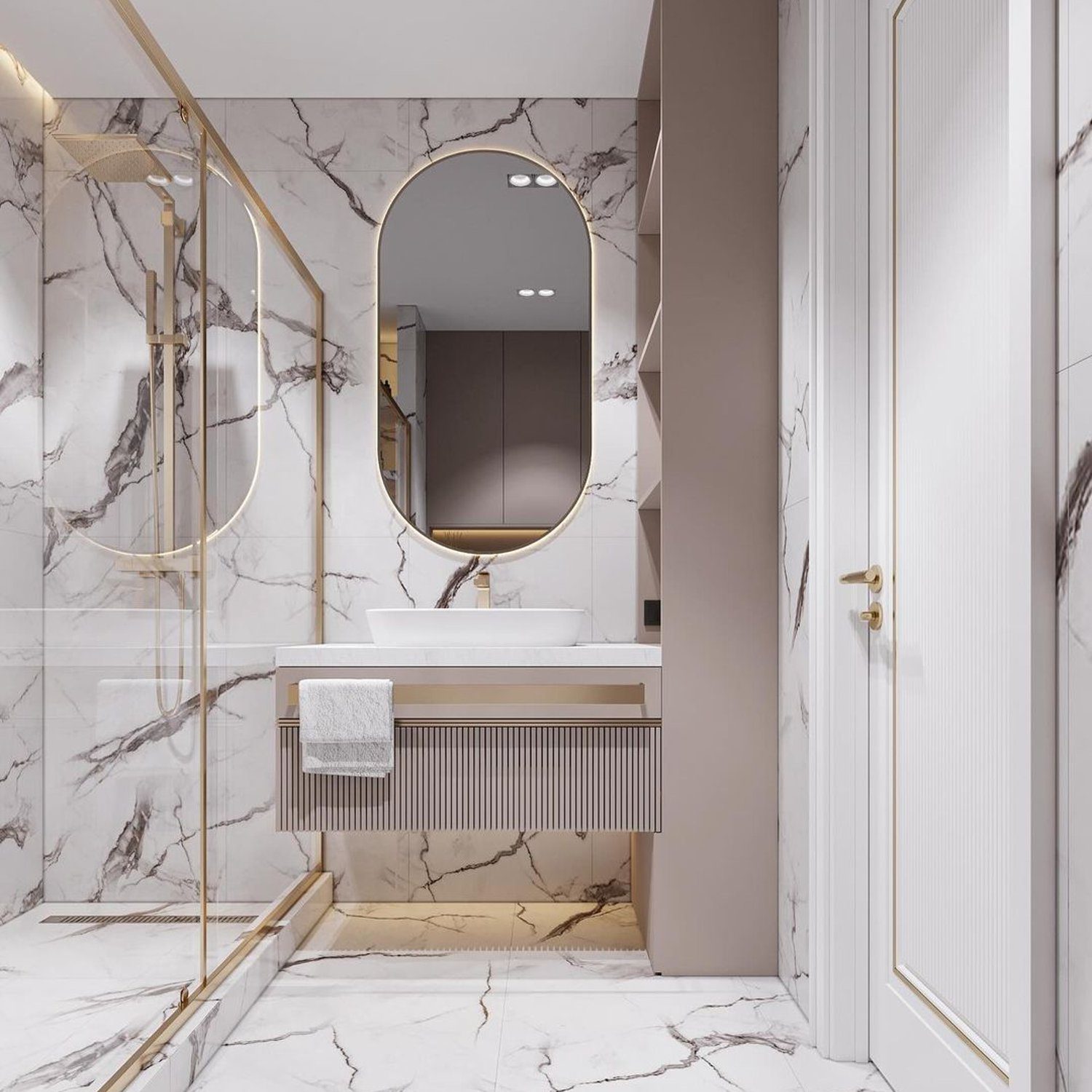 Luxurious bathroom with marble tiles and gold accents