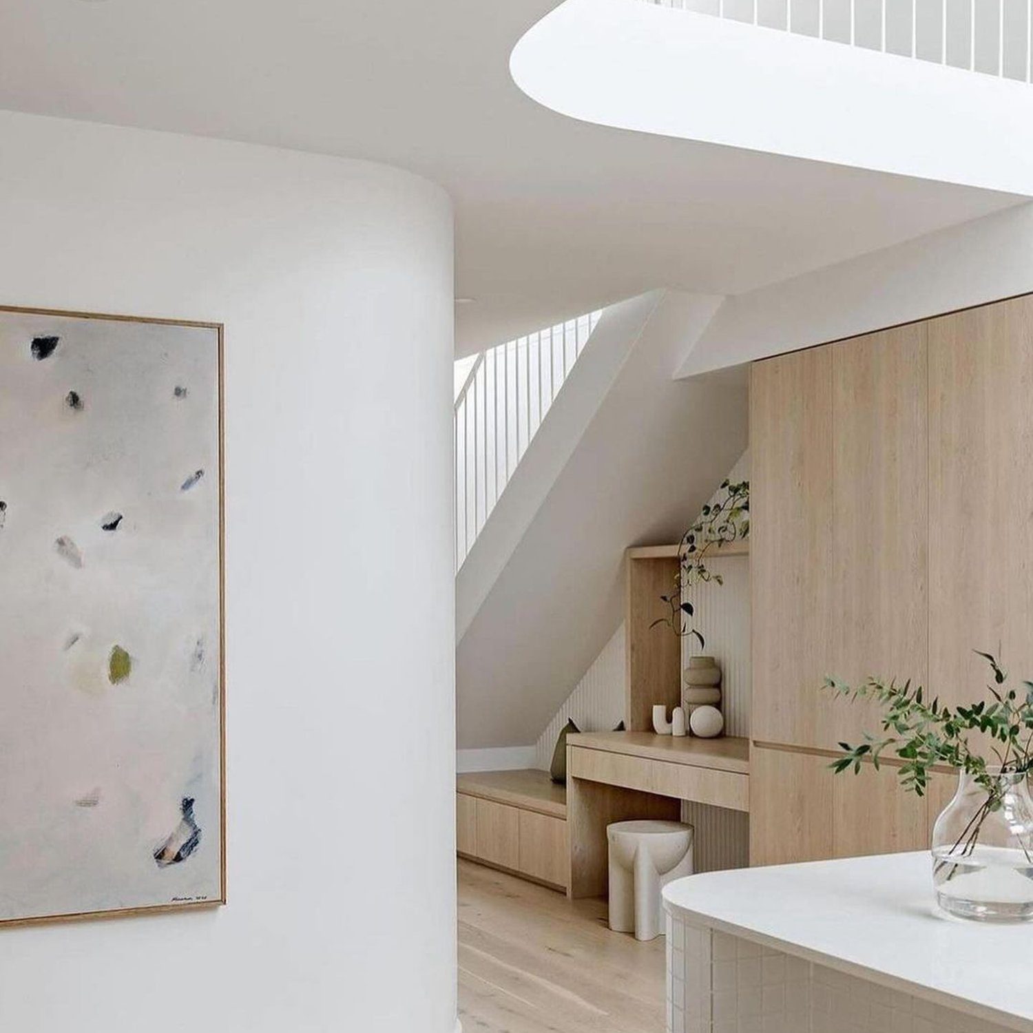 Elegant minimalist interior with a harmonious blend of wood and white tones