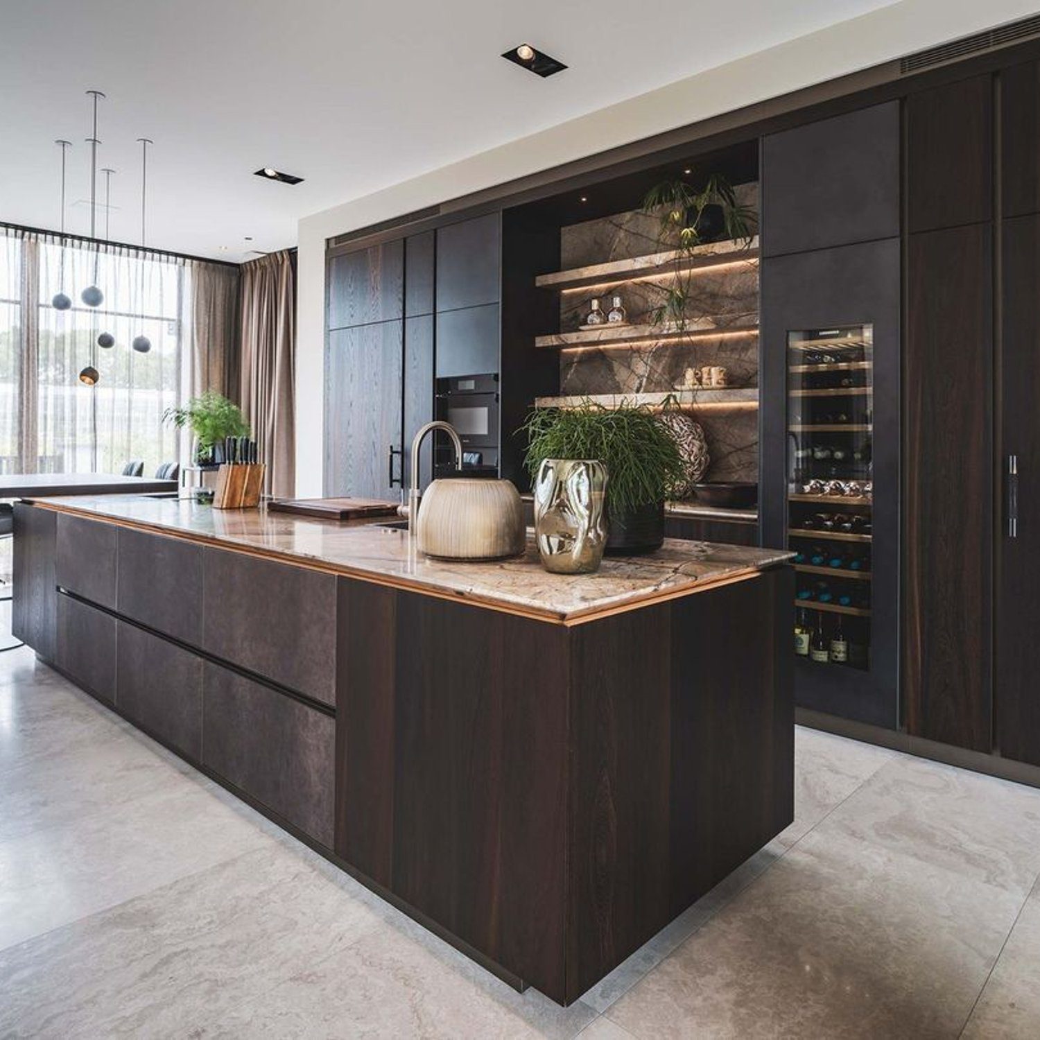 Elegant modern kitchen with dark wood cabinetry