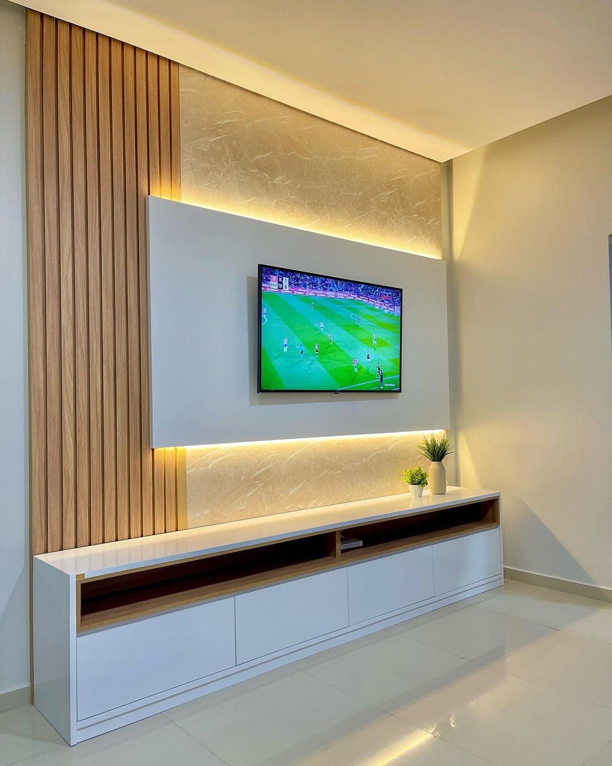 Elegant modern living room with a wall-mounted TV