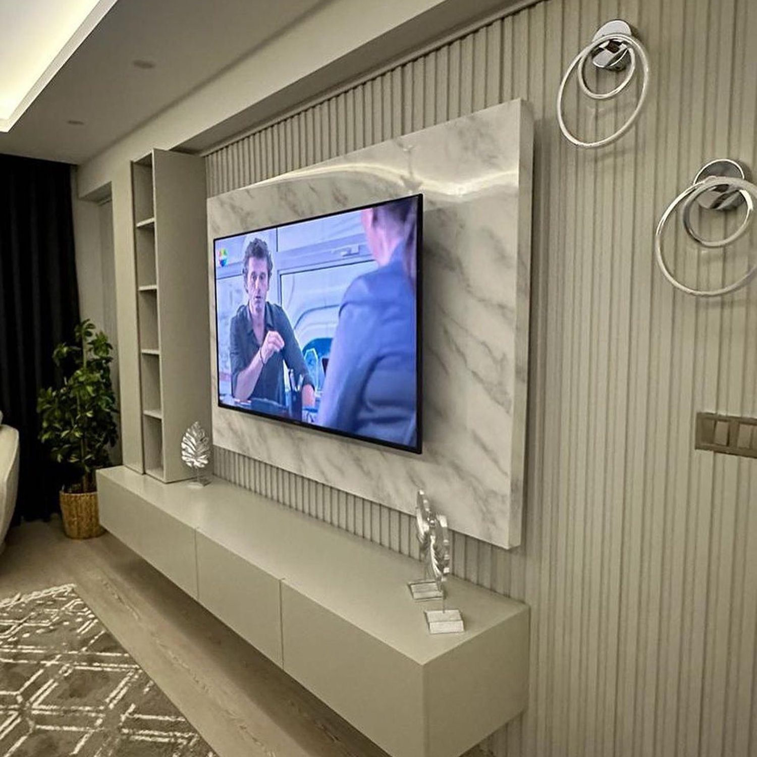 Elegant modern living room with mounted TV