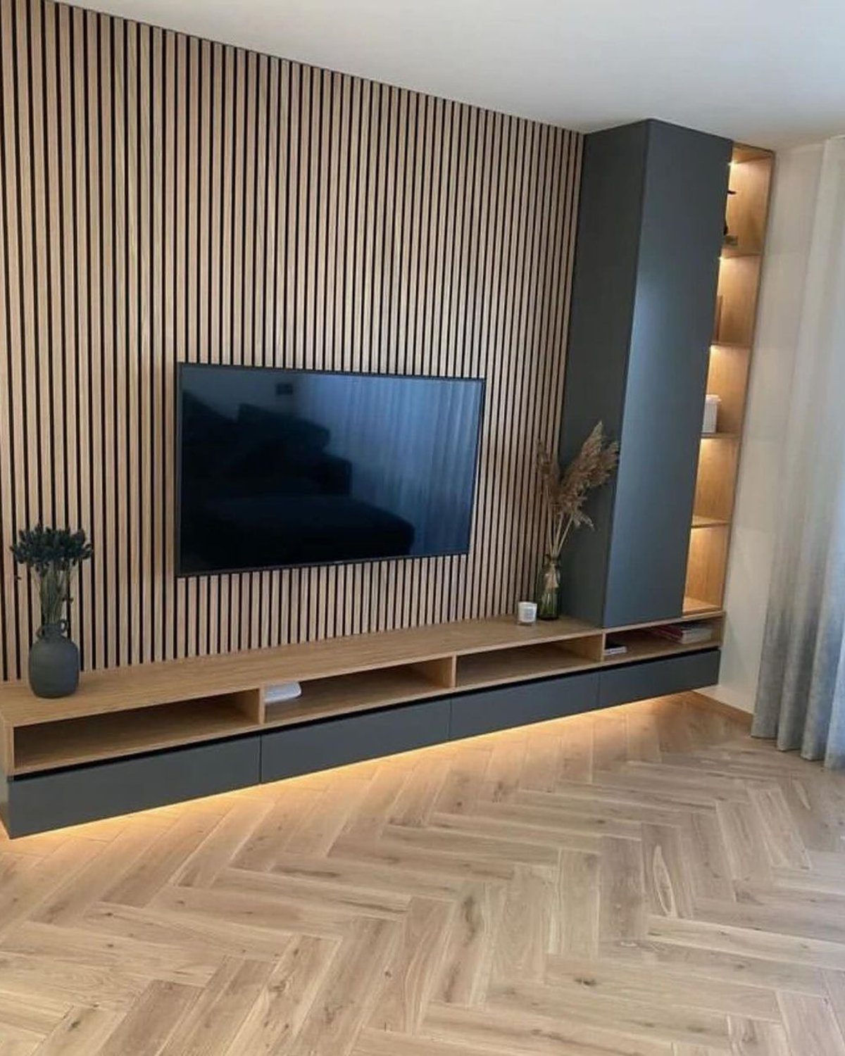 Elegant modern TV wall unit with wooden slats