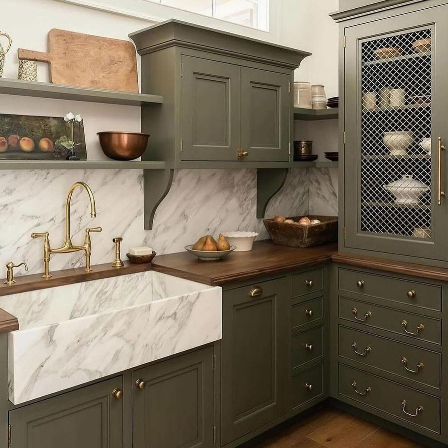 Elegant kitchen with olive green cabinetry