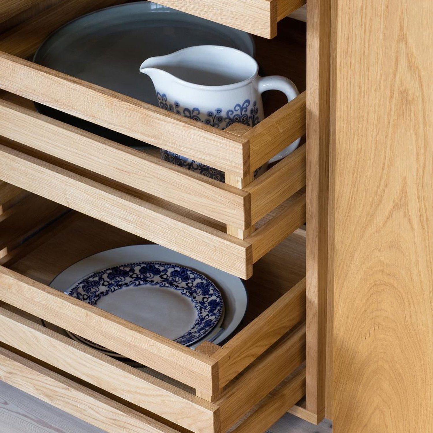 Elegant wooden plate rack with blue and white china