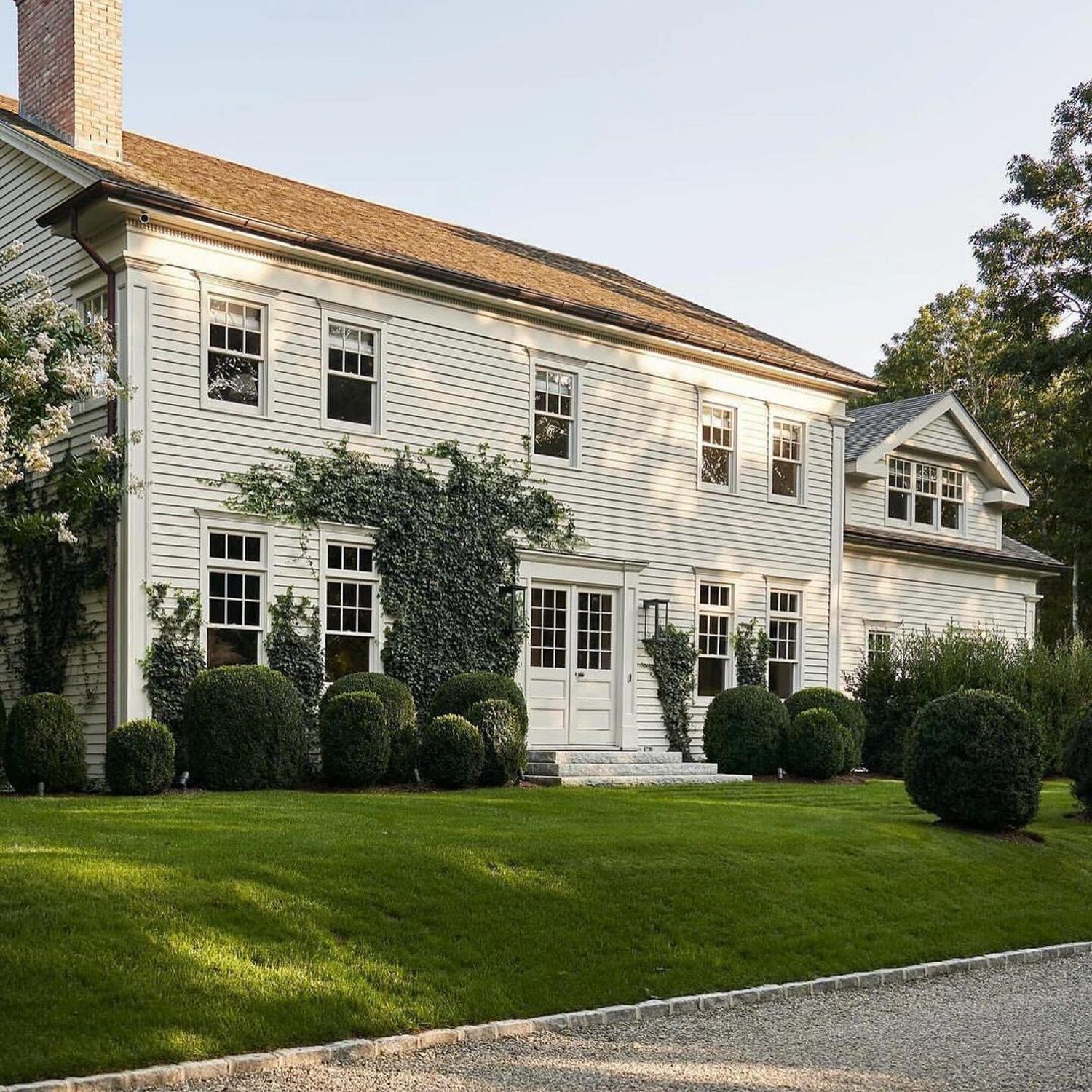 Traditional two-story house with impeccable landscaping