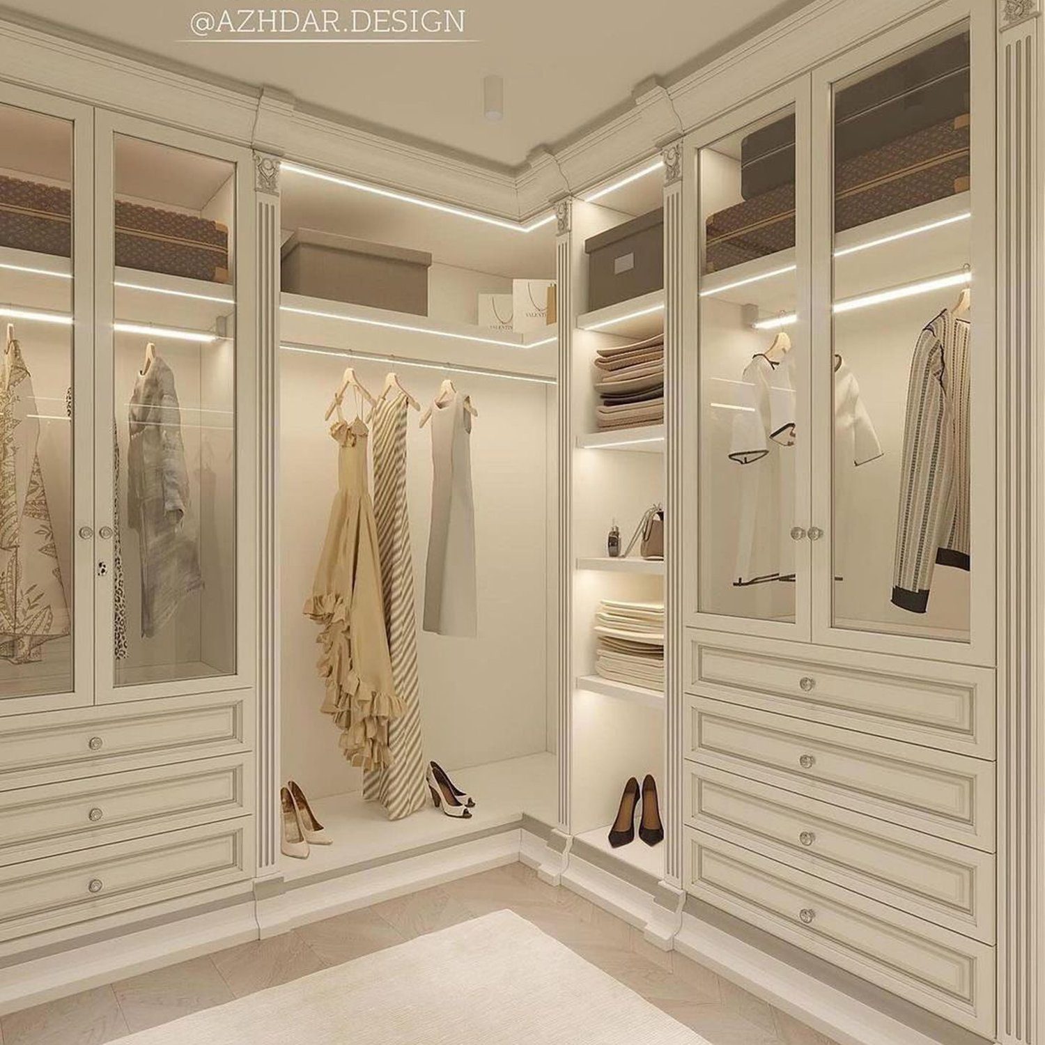 Elegant walk-in closet design featuring traditional white cabinetry and smart lighting.