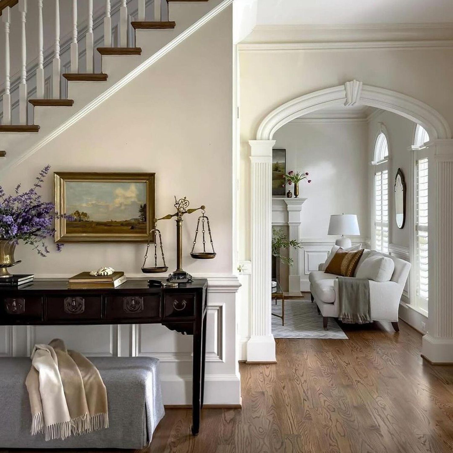 Elegant transitional entryway with classic design elements