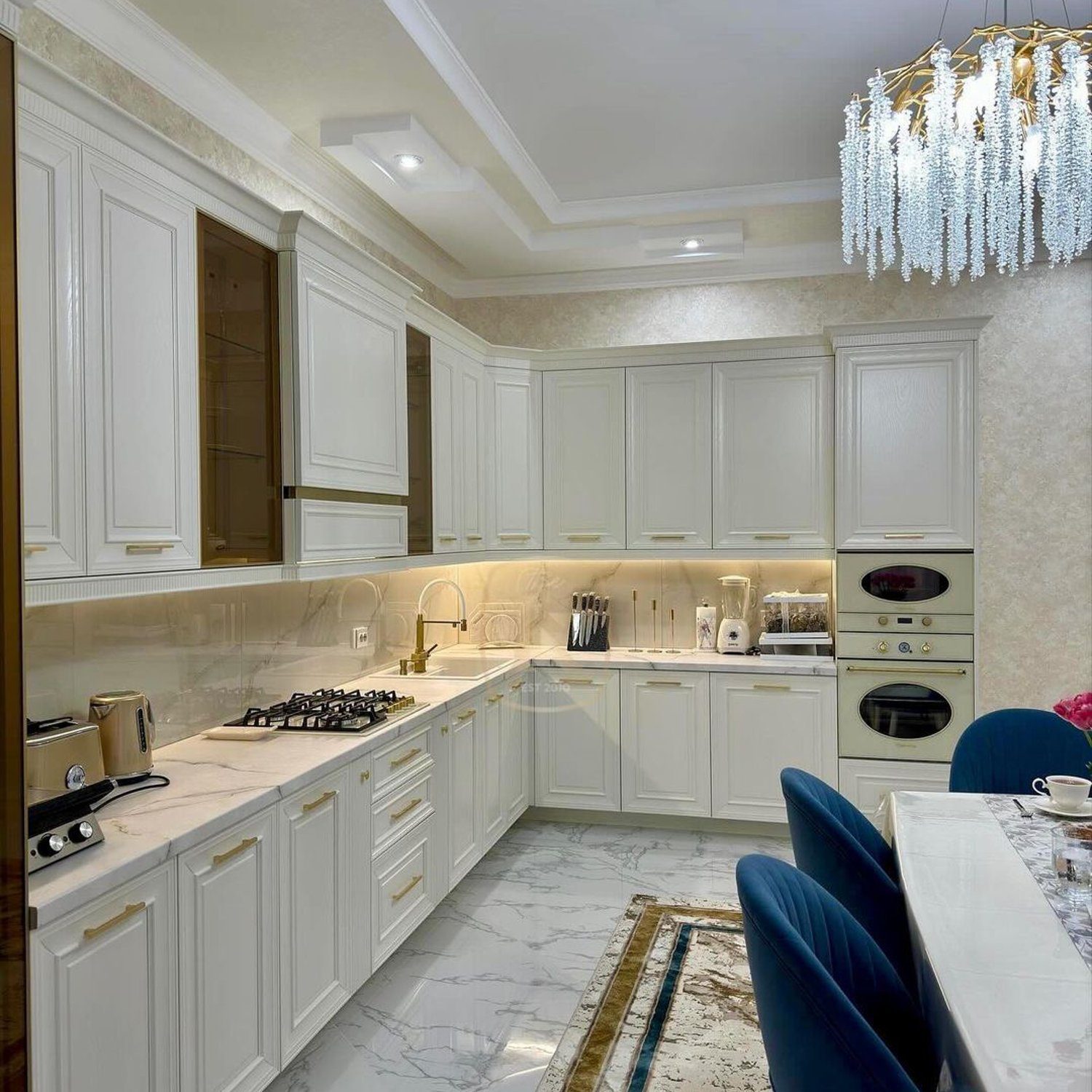 Elegant White Kitchen with Marble Details