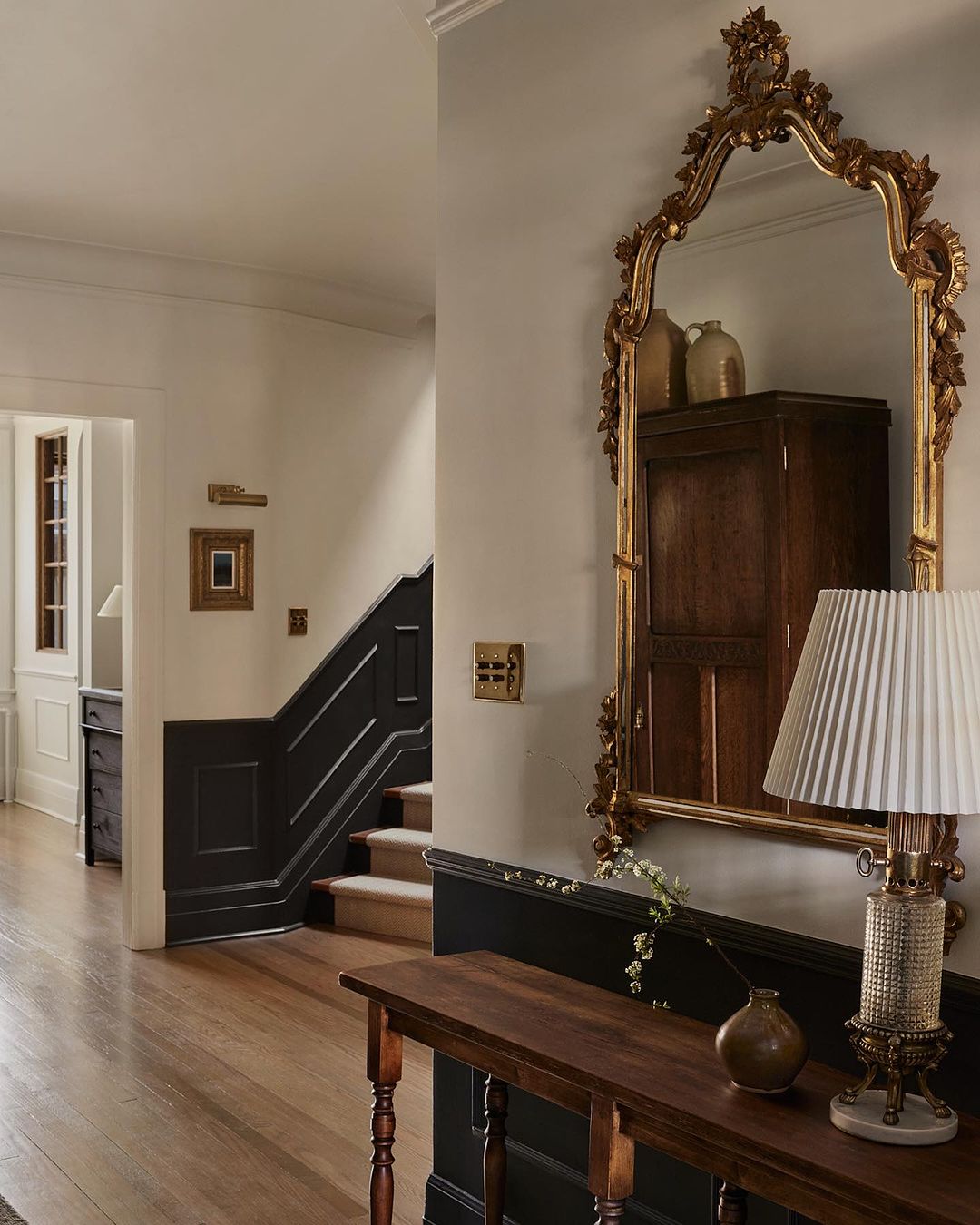 A tastefully arranged entryway with a classic vibe