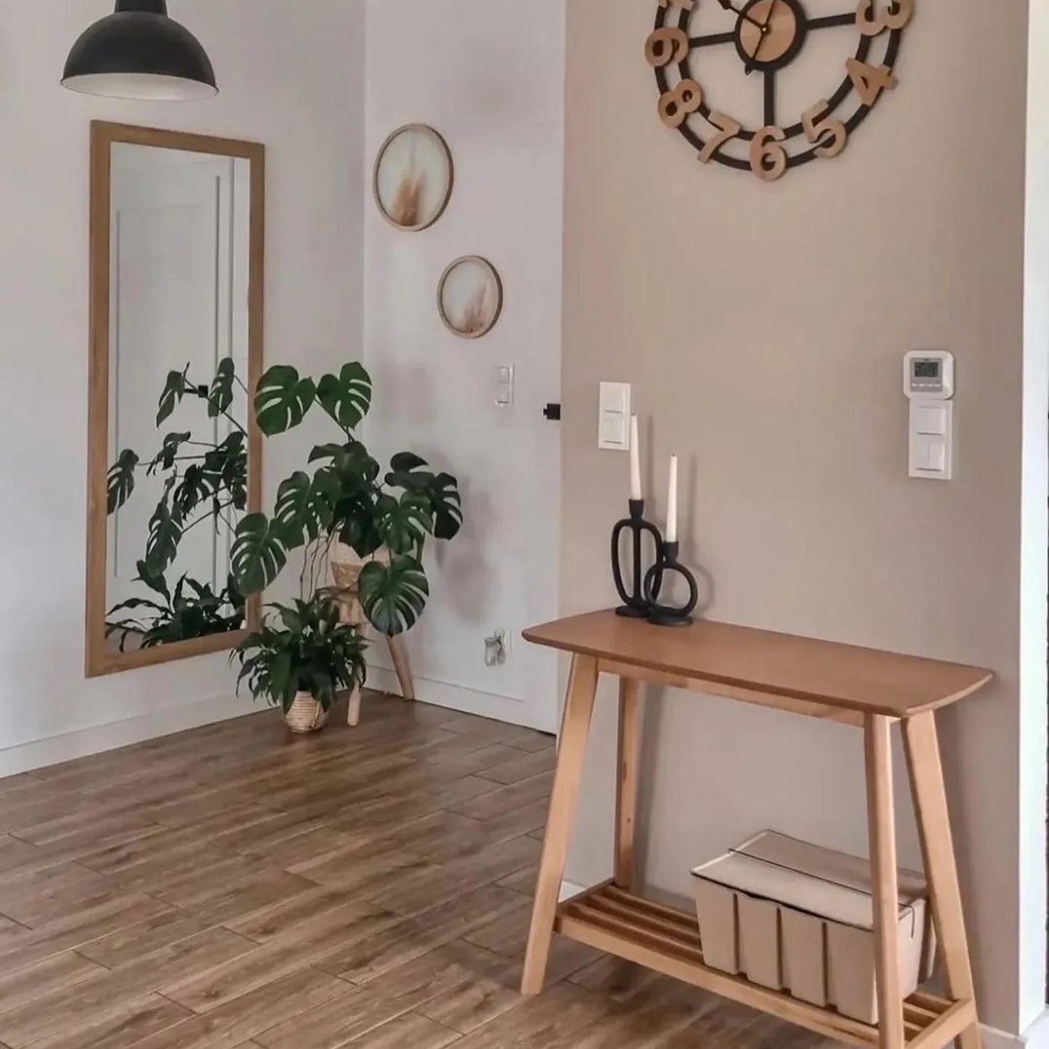 A neatly organized entryway with minimalist decor