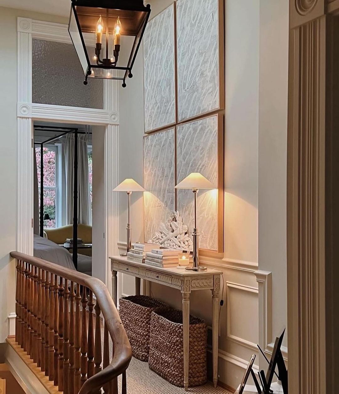 A tastefully adorned hallway with artful lighting and textured wall panels