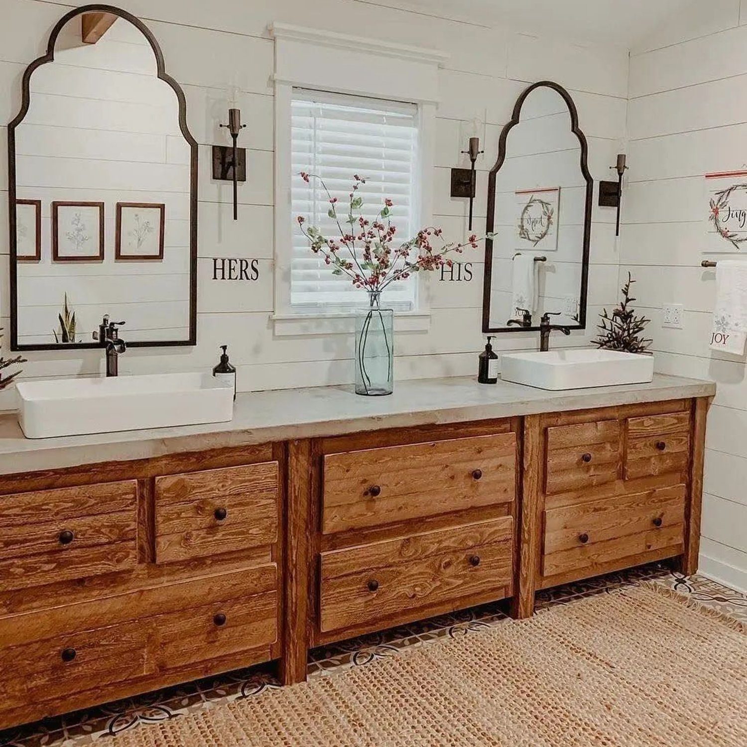 A beautifully designed bathroom with dual vanities