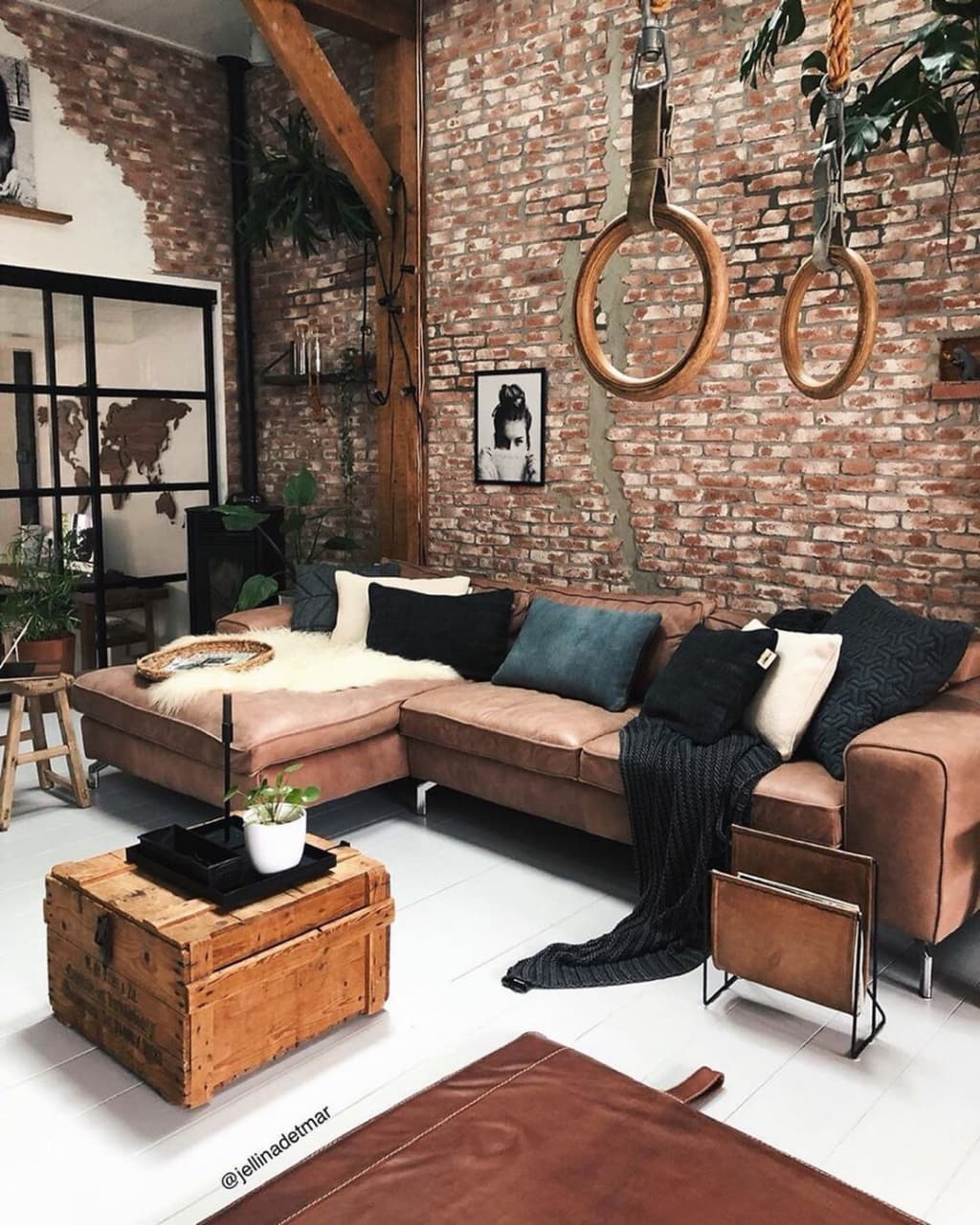 Industrial-chic living room with exposed brick walls and rustic decor