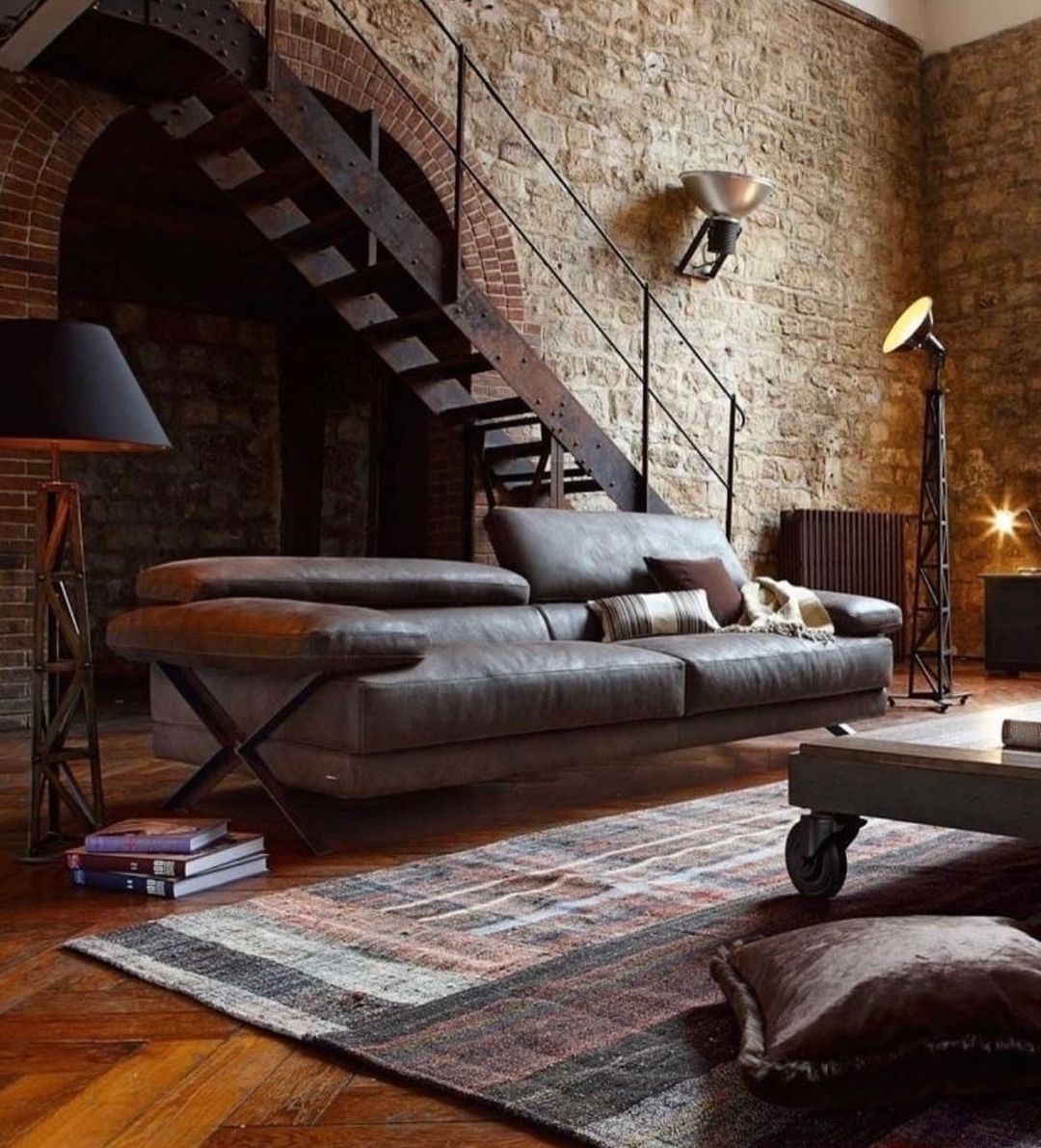 Loft style living room with exposed brick walls