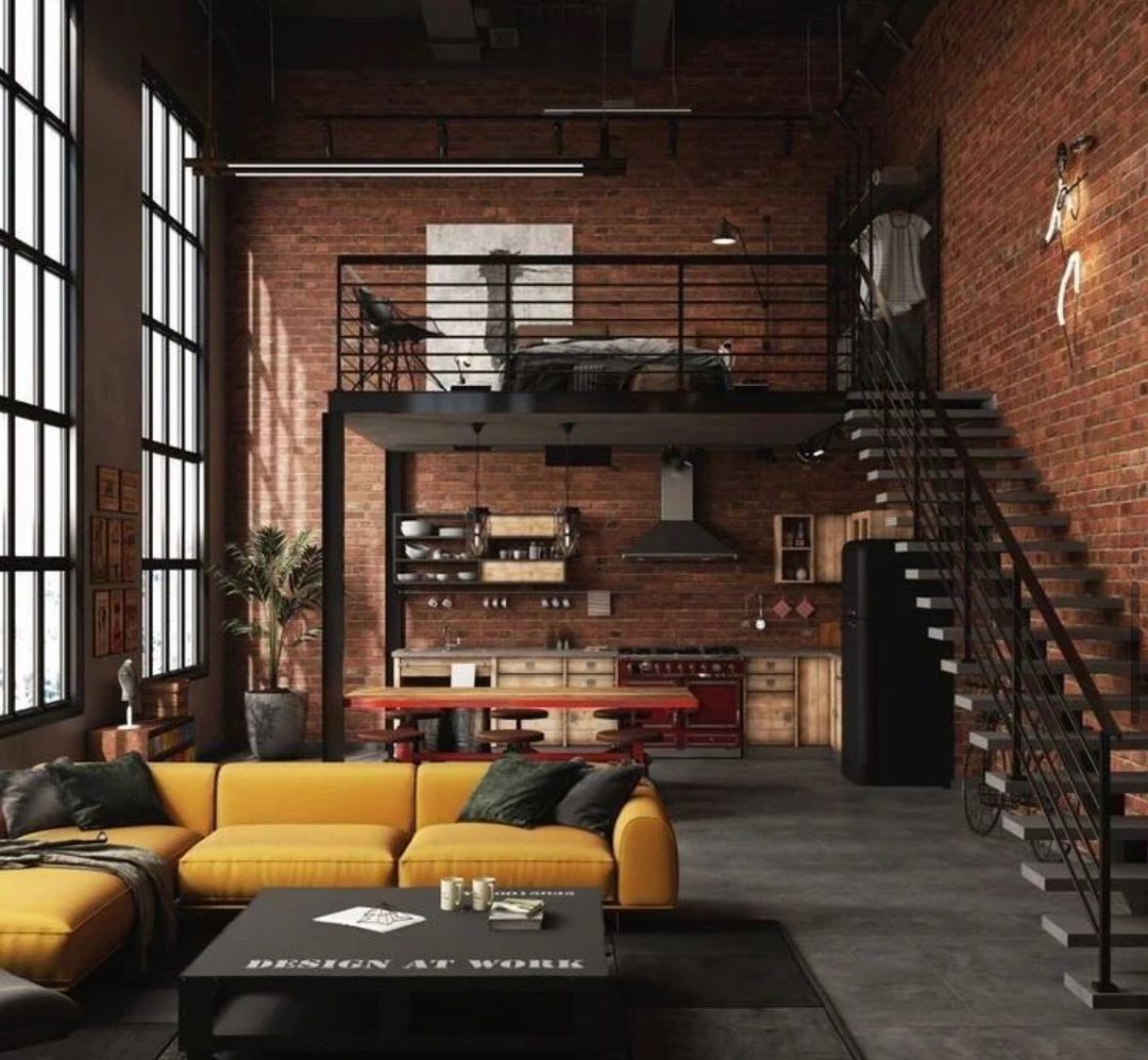 Loft-style apartment with exposed brick walls and vibrant yellow sofa